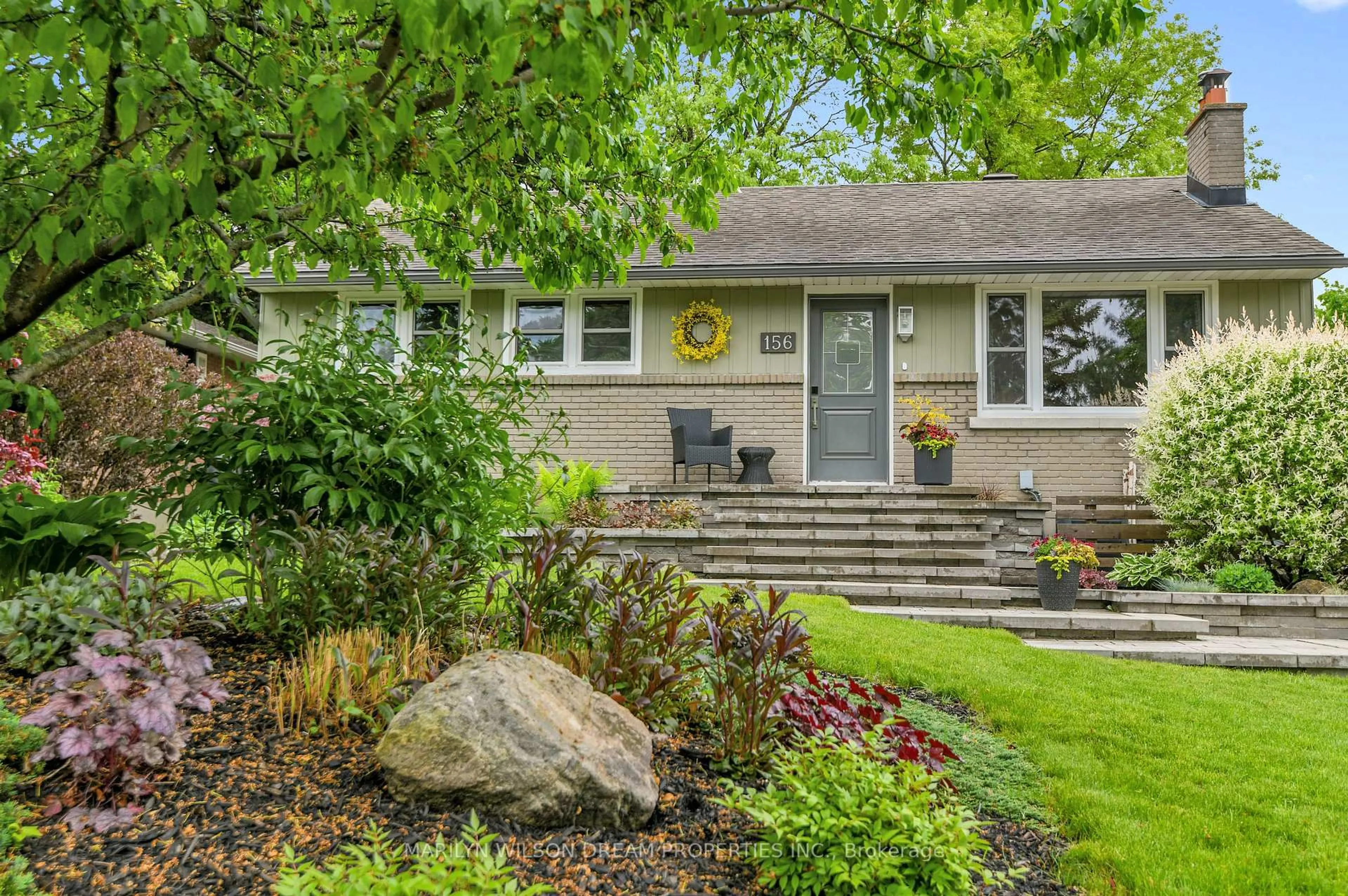 Home with vinyl exterior material, street for 156 Dahlia Ave, Ottawa Ontario K1H 6G2