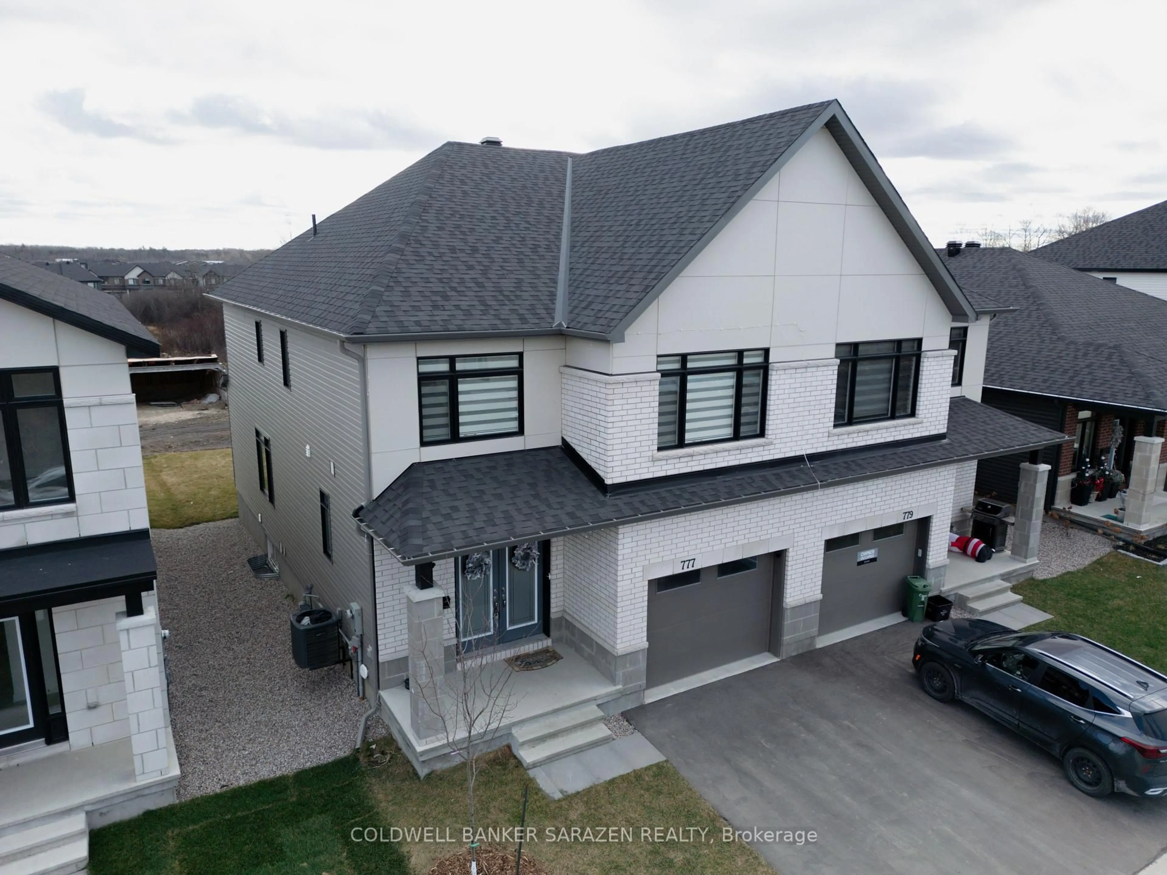 A pic from outside/outdoor area/front of a property/back of a property/a pic from drone, street for 777 Ovation Grve, Ottawa Ontario K1T 0X6