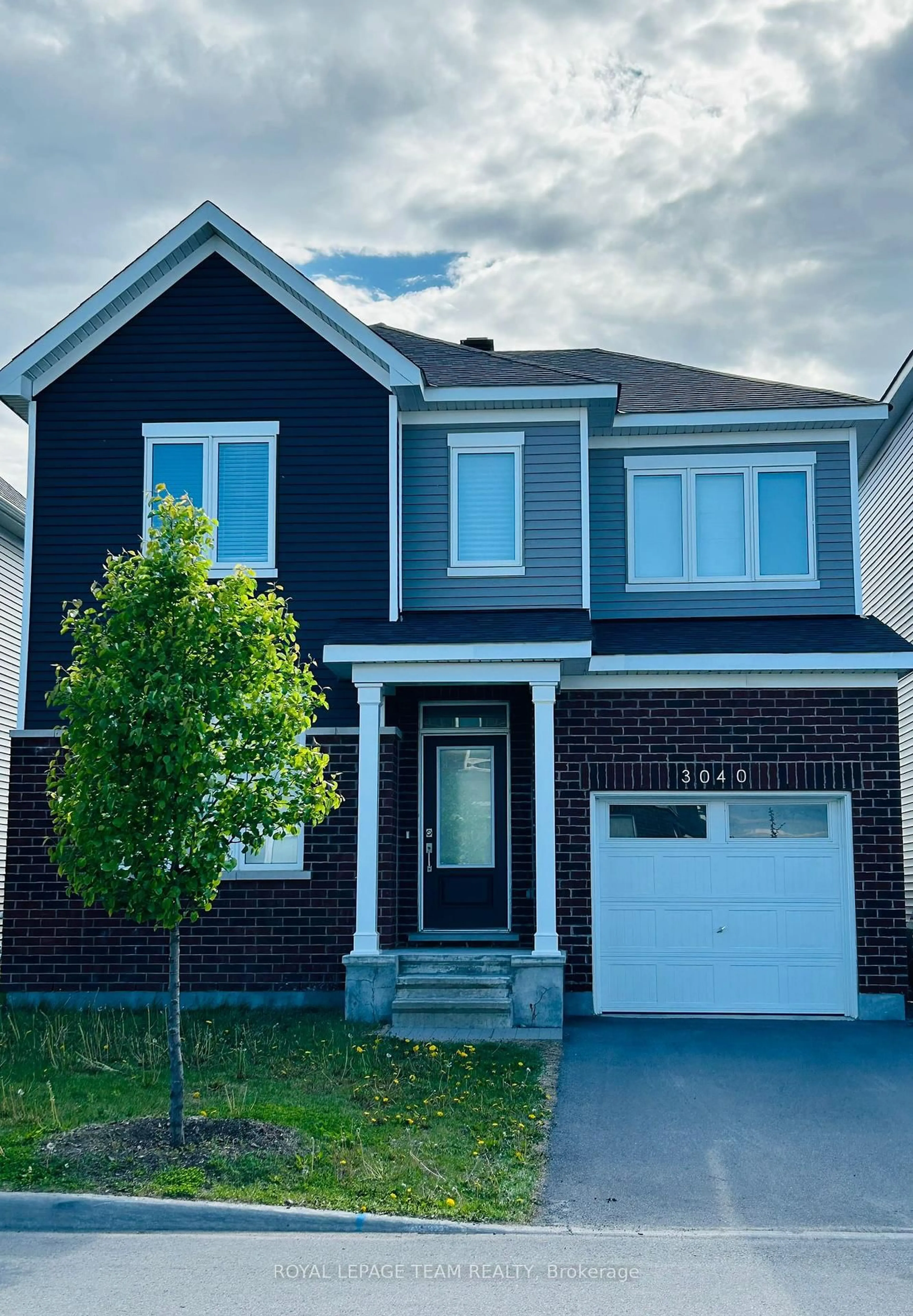 Home with brick exterior material, street for 3040 Travertine Way, Ottawa Ontario K2J 6W9