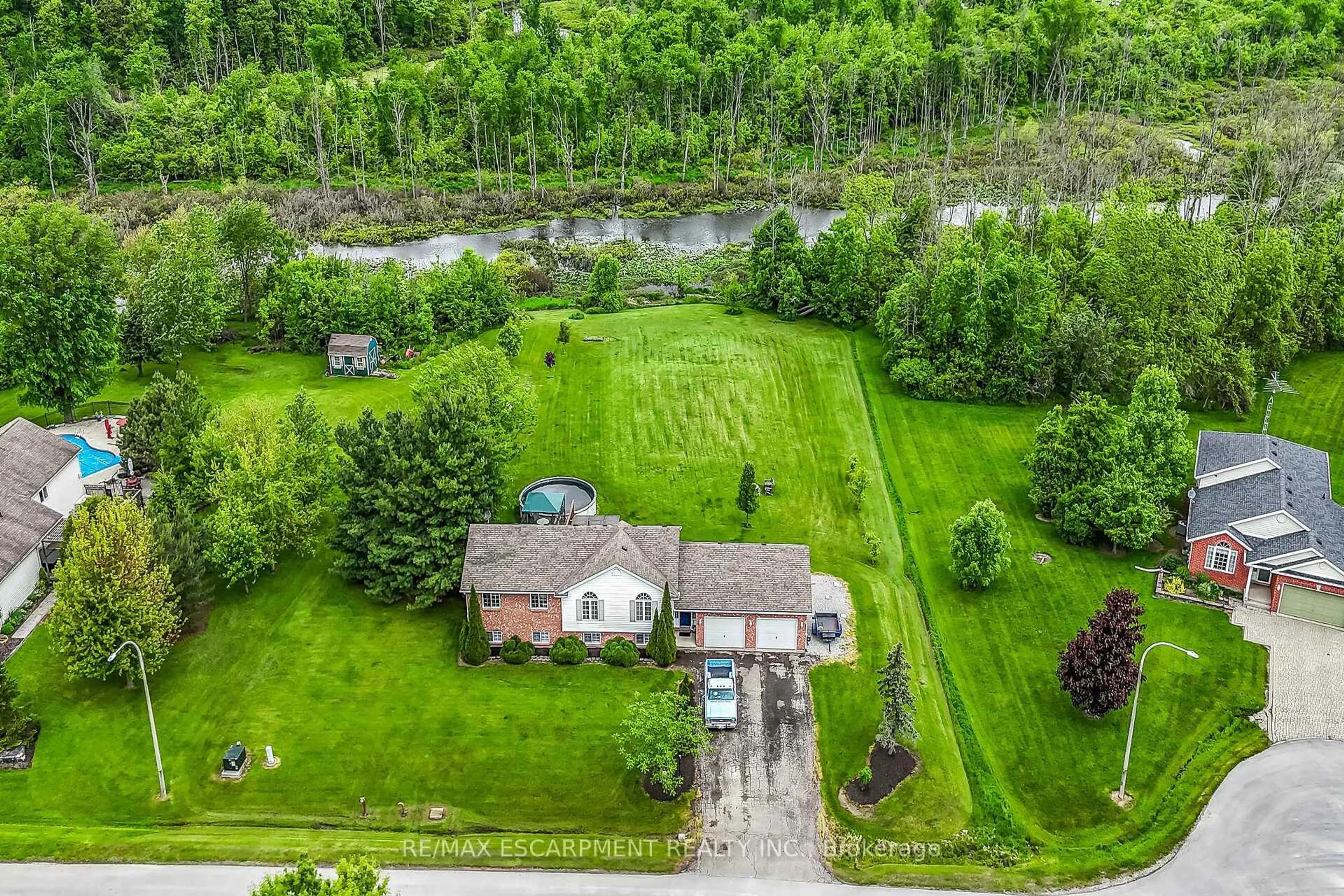 A pic from outside/outdoor area/front of a property/back of a property/a pic from drone, water/lake/river/ocean view for 5271 Beavercreek Cres, West Lincoln Ontario L0R 2J0