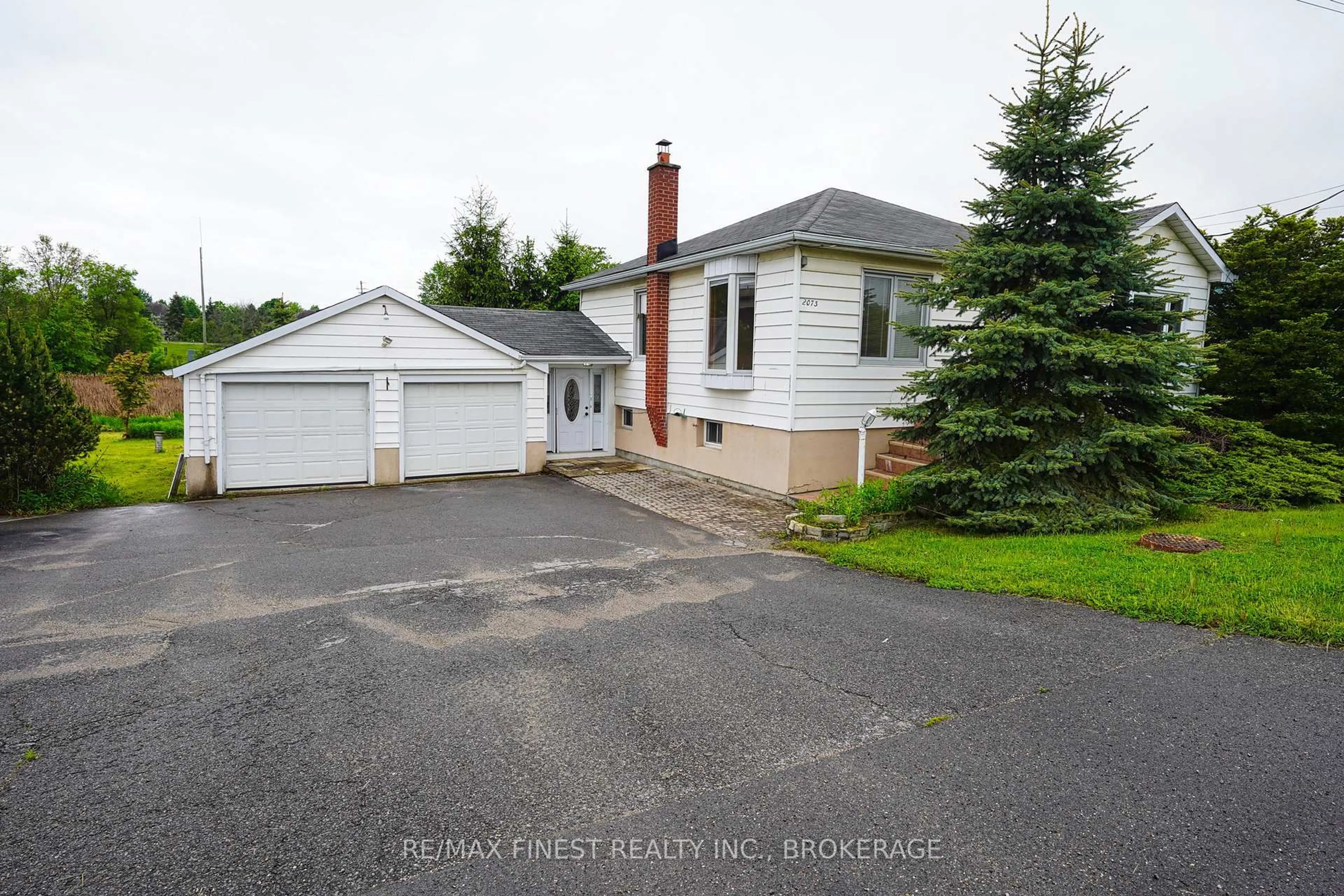 A pic from outside/outdoor area/front of a property/back of a property/a pic from drone, street for 2073 Bath Rd, Kingston Ontario K7M 8V9