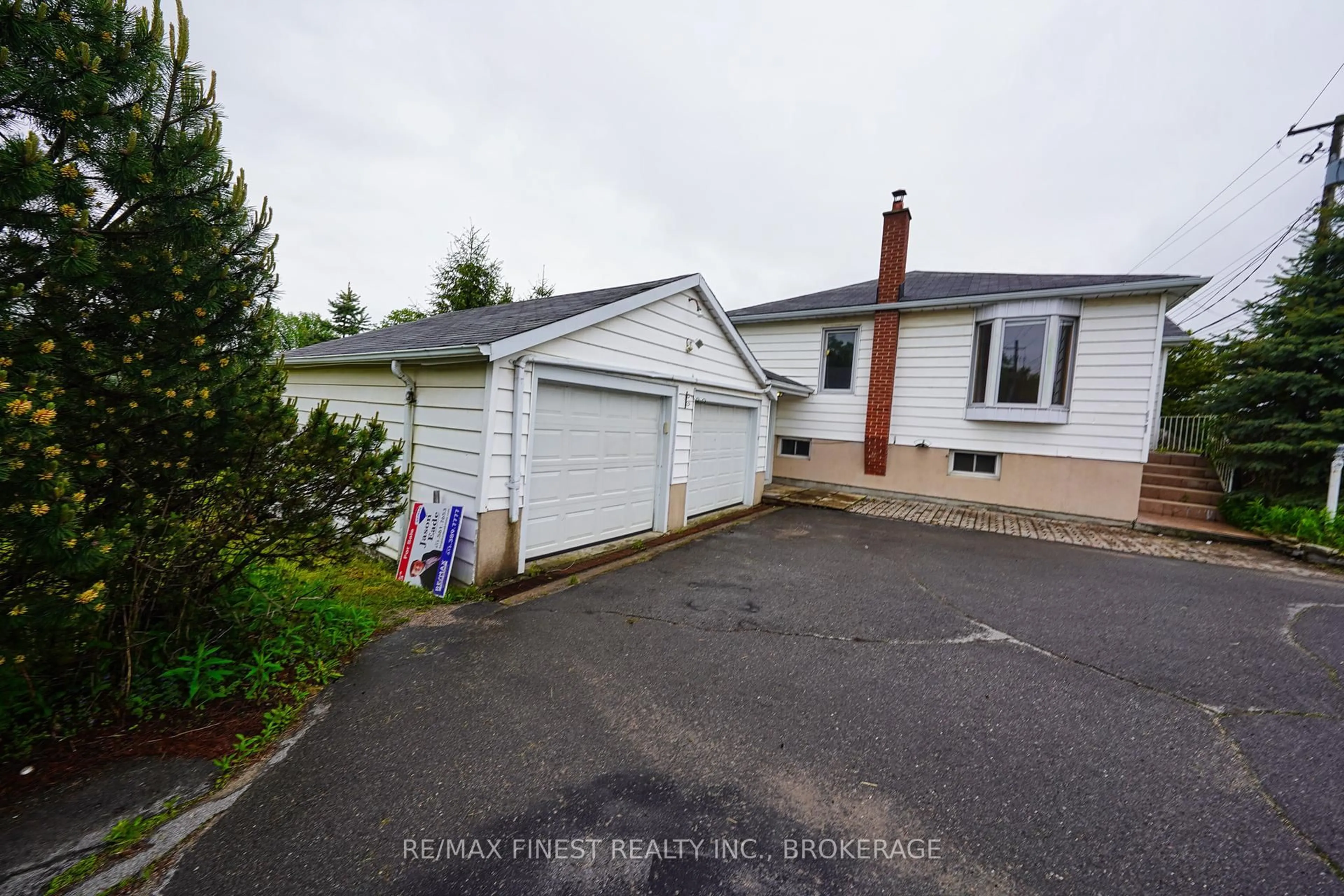 A pic from outside/outdoor area/front of a property/back of a property/a pic from drone, street for 2073 Bath Rd, Kingston Ontario K7M 8V9