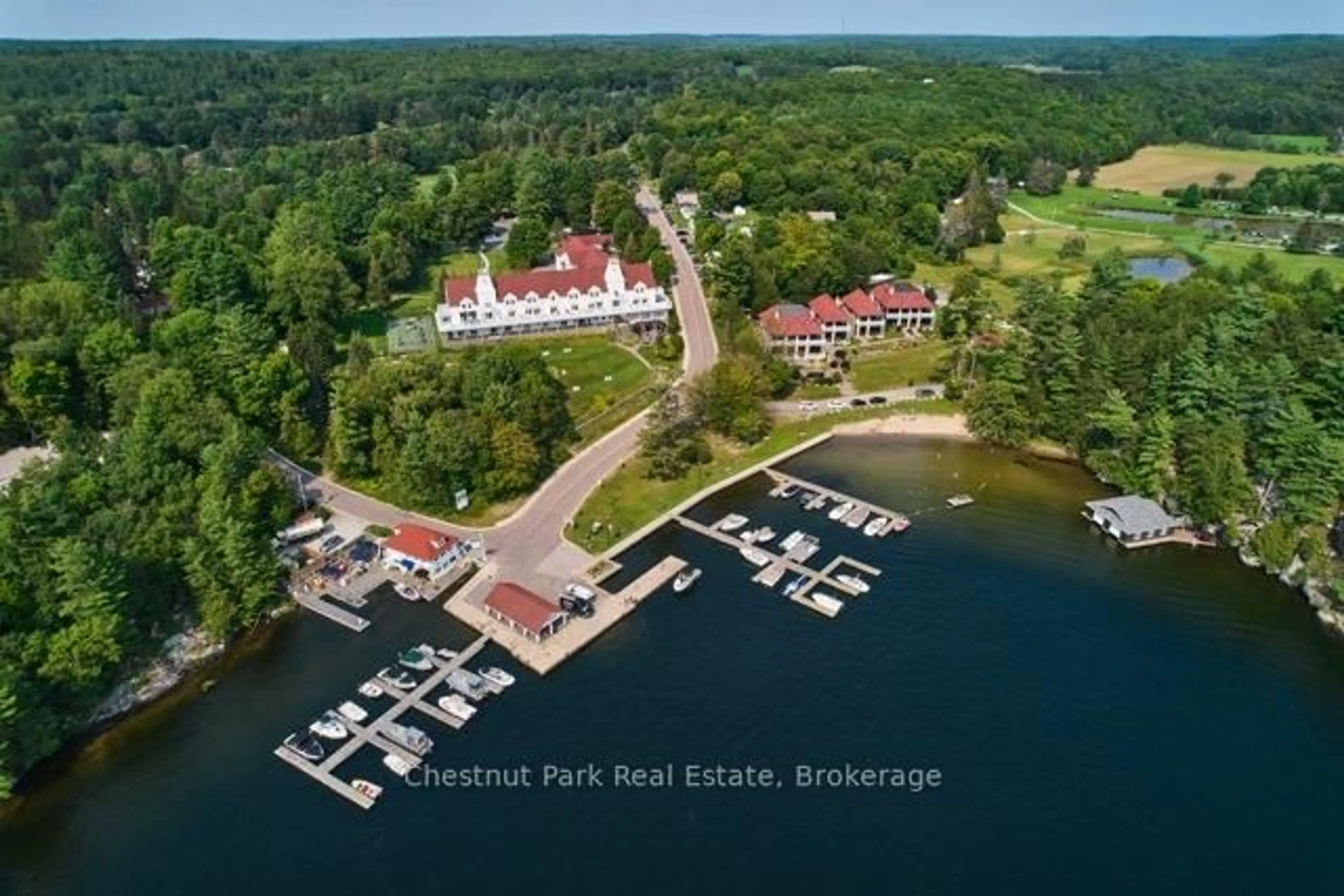 A pic from outside/outdoor area/front of a property/back of a property/a pic from drone, water/lake/river/ocean view for 1003 MATTHEWS Dr #C5 12SA & 12SC, Muskoka Lakes Ontario P0B 1P0