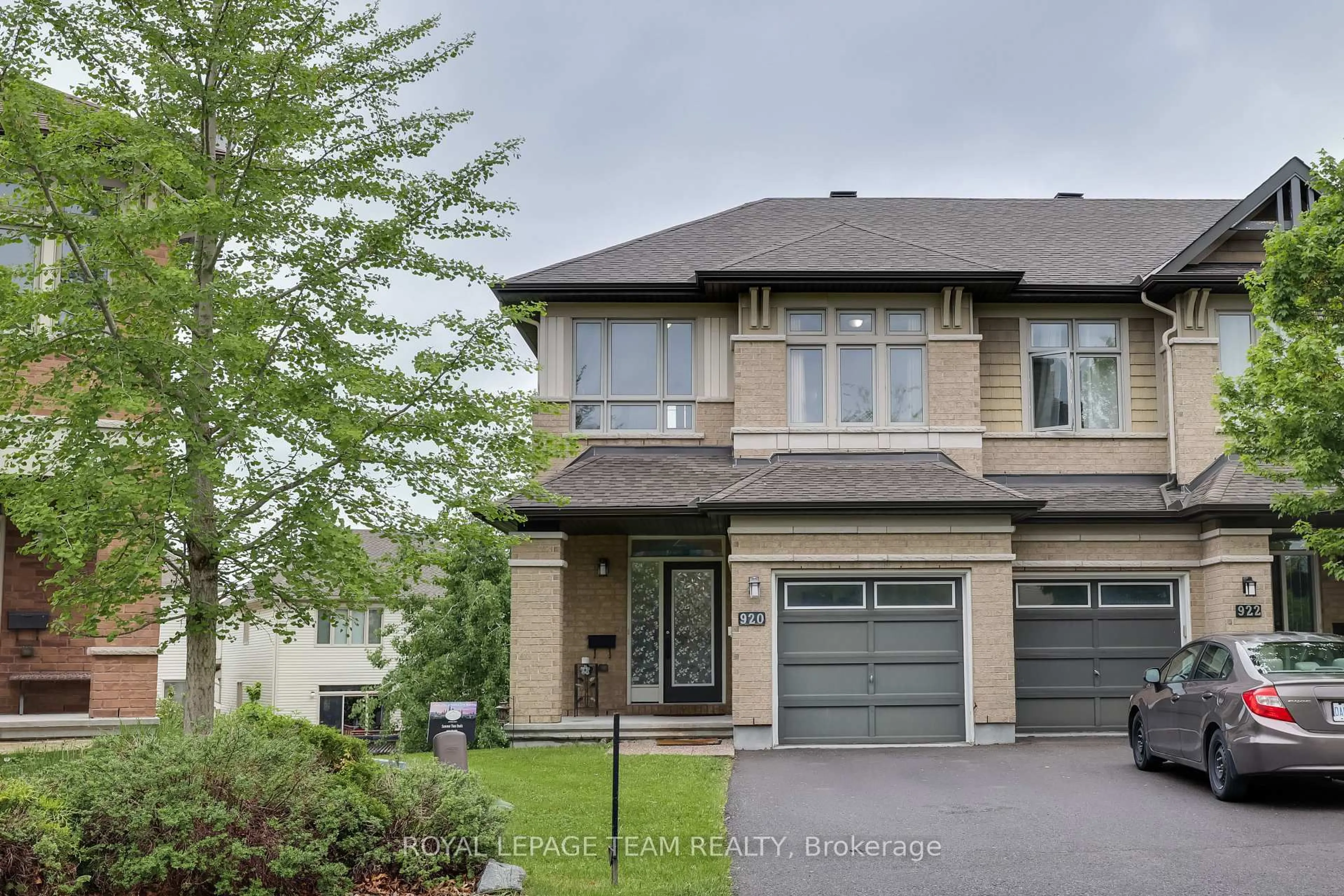 Home with brick exterior material, street for 920 Fletcher Circ, Ottawa Ontario K2T 0B7