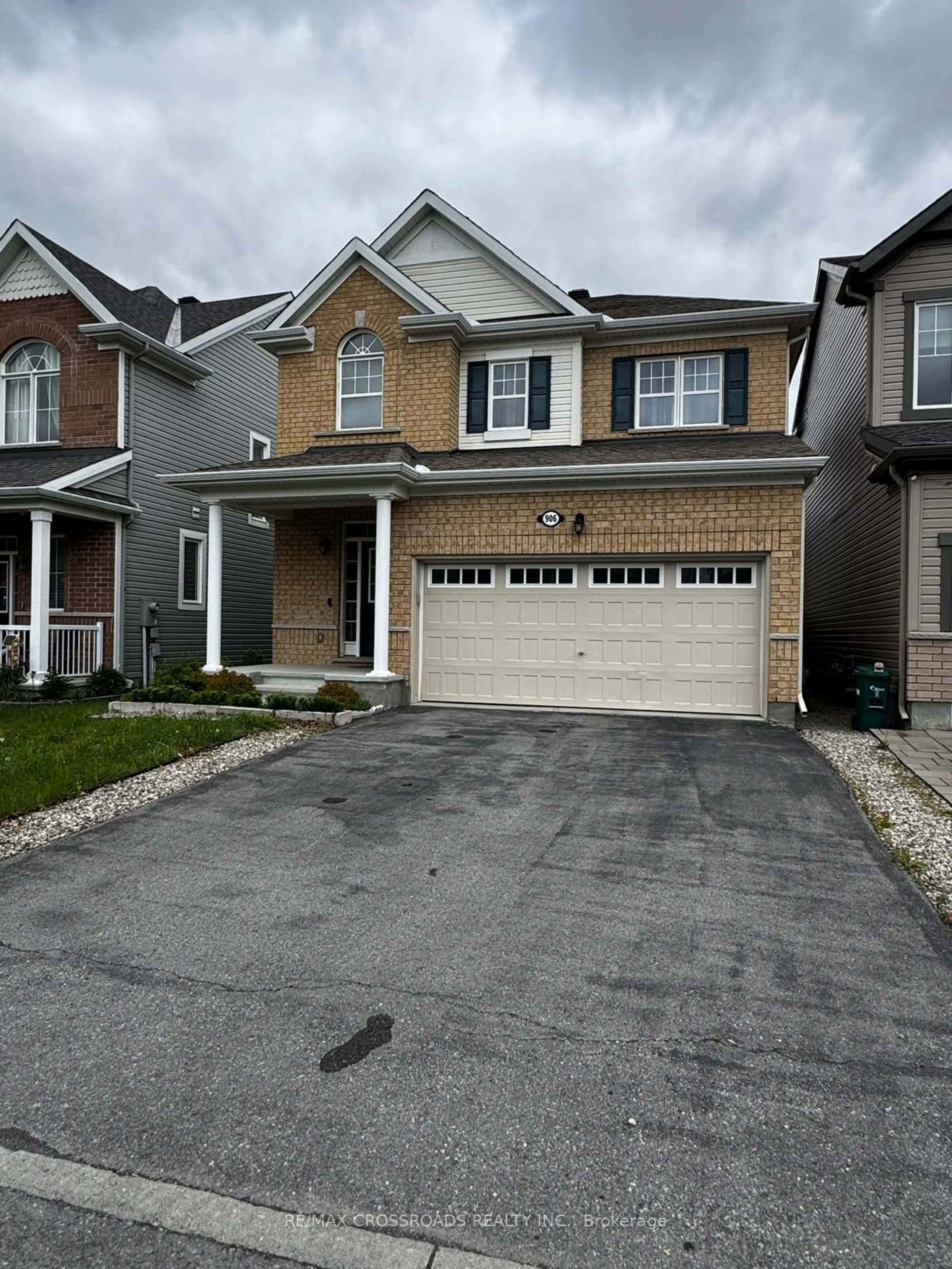 Home with brick exterior material, street for 906 Whimbrel Way, Ottawa Ontario K2J 6C5