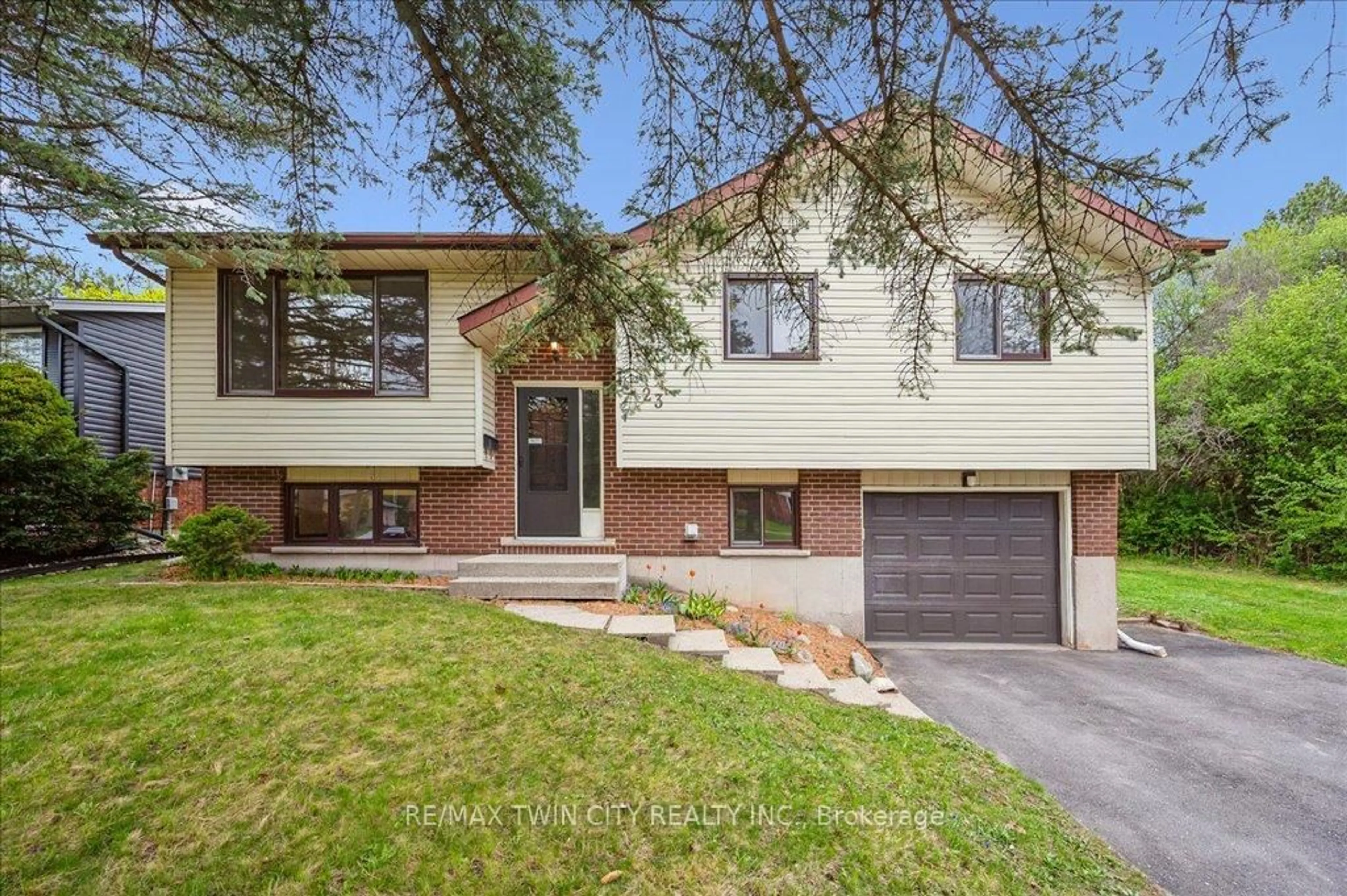 Home with brick exterior material, street for 23 Black Walnut Dr, Kitchener Ontario N2P 1N9