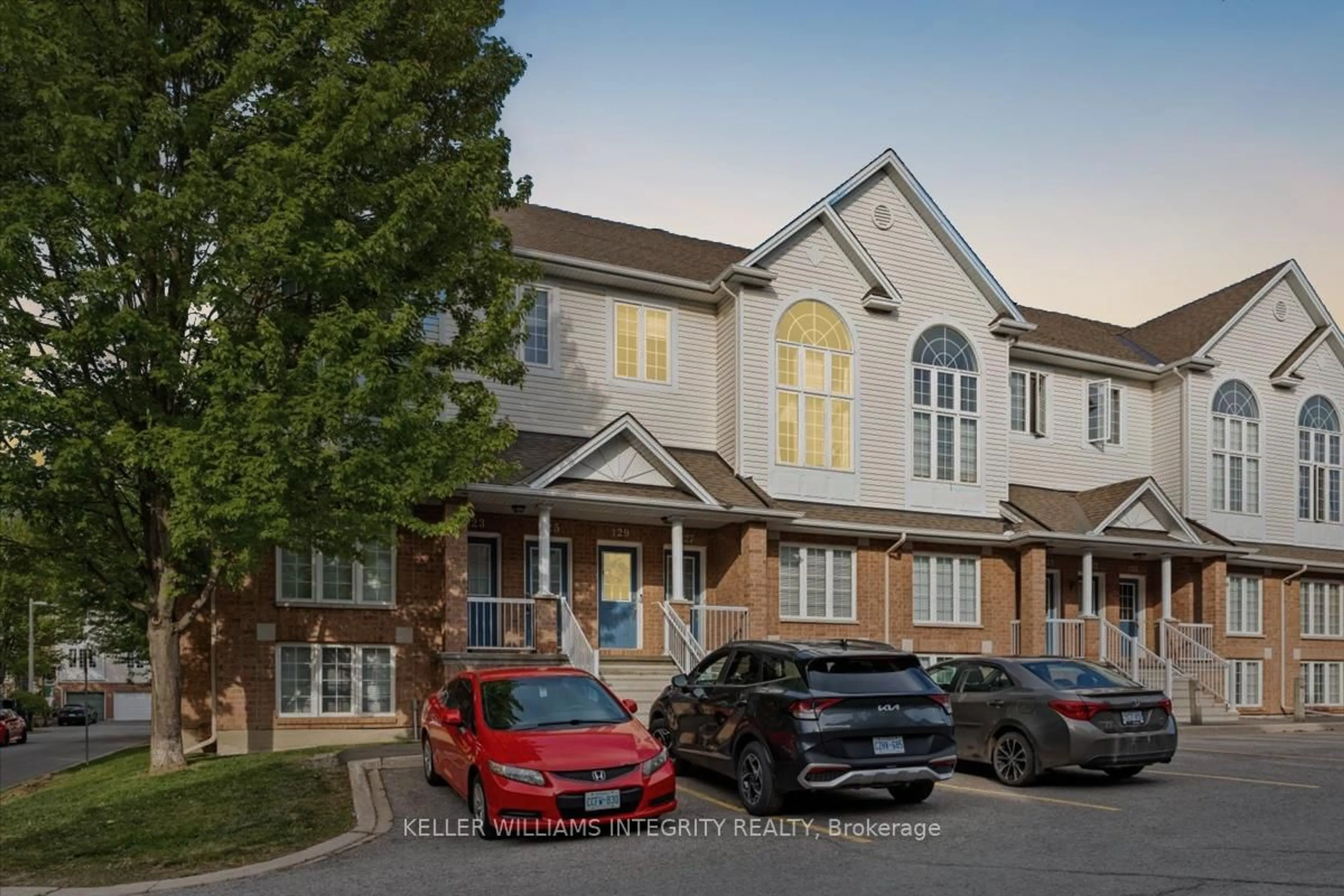 A pic from outside/outdoor area/front of a property/back of a property/a pic from drone, street for 129 Wharhol Private #32, Ottawa Ontario K2H 1G7