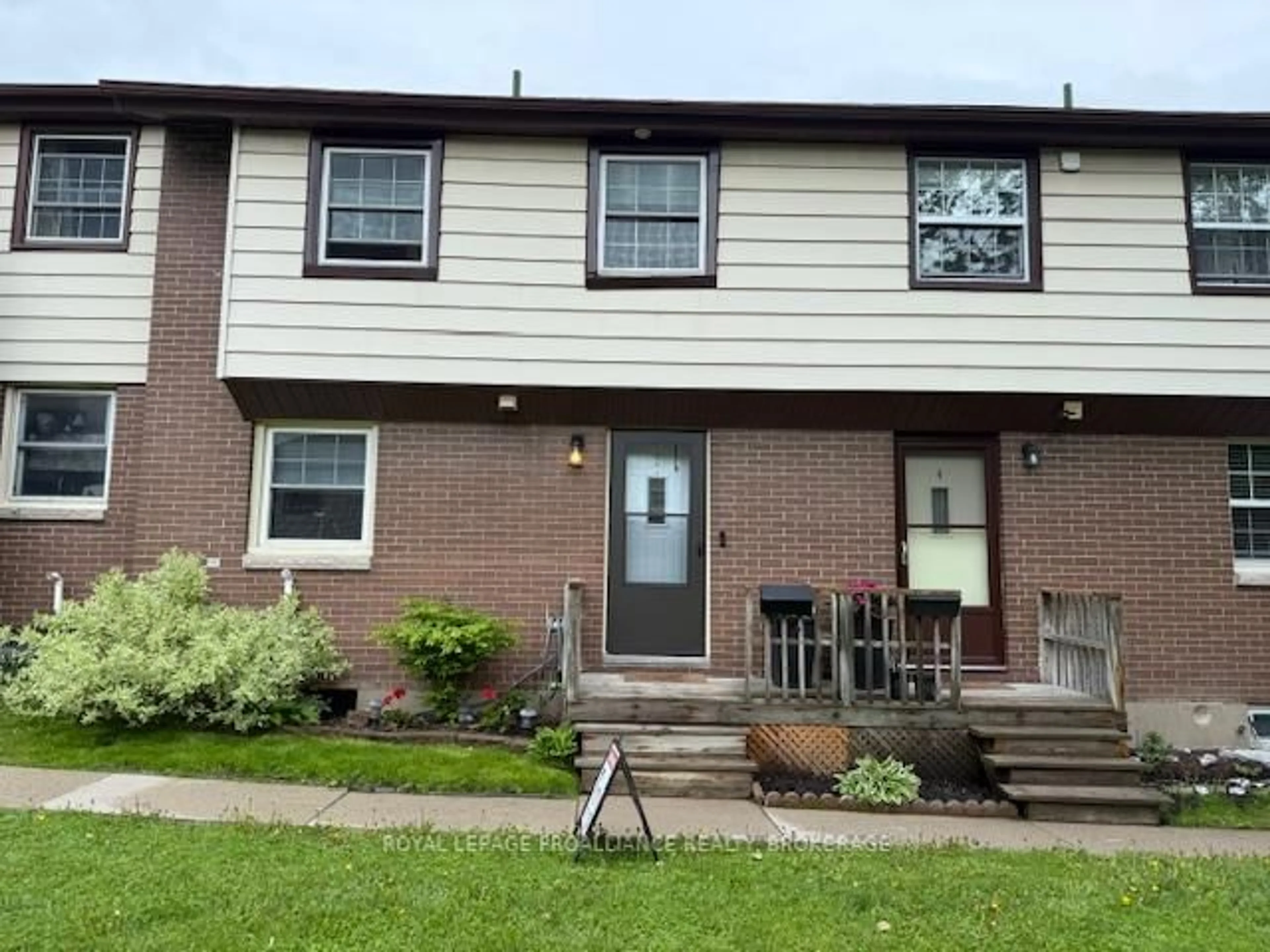 Home with vinyl exterior material, street for 126 Notch Hill Rd #3, Kingston Ontario K7M 2X1
