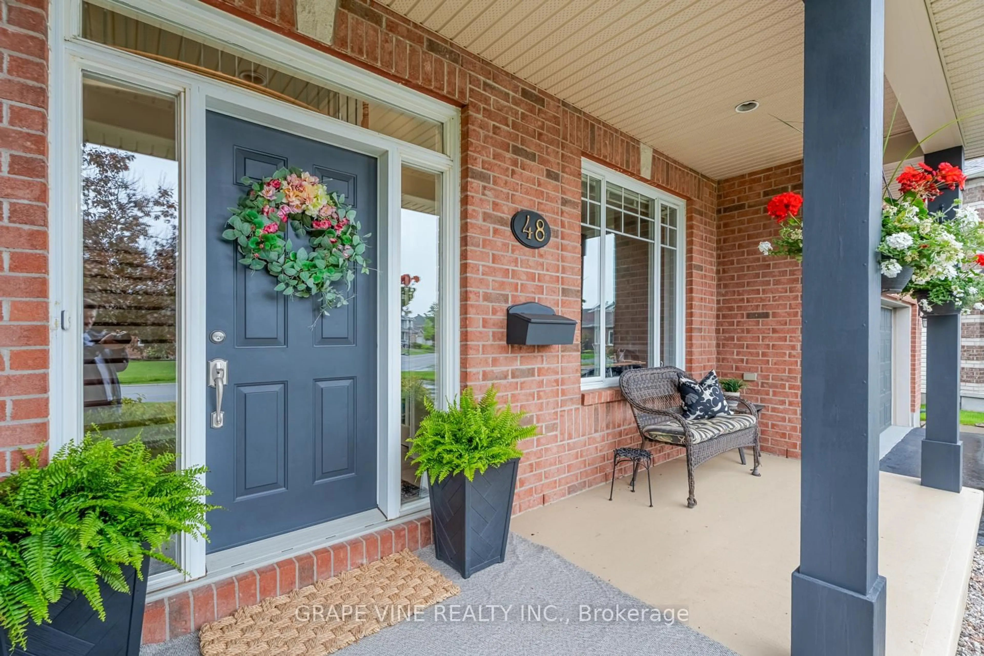 Home with brick exterior material, street for 48 Cinnabar Way, Ottawa Ontario K2S 1Y6