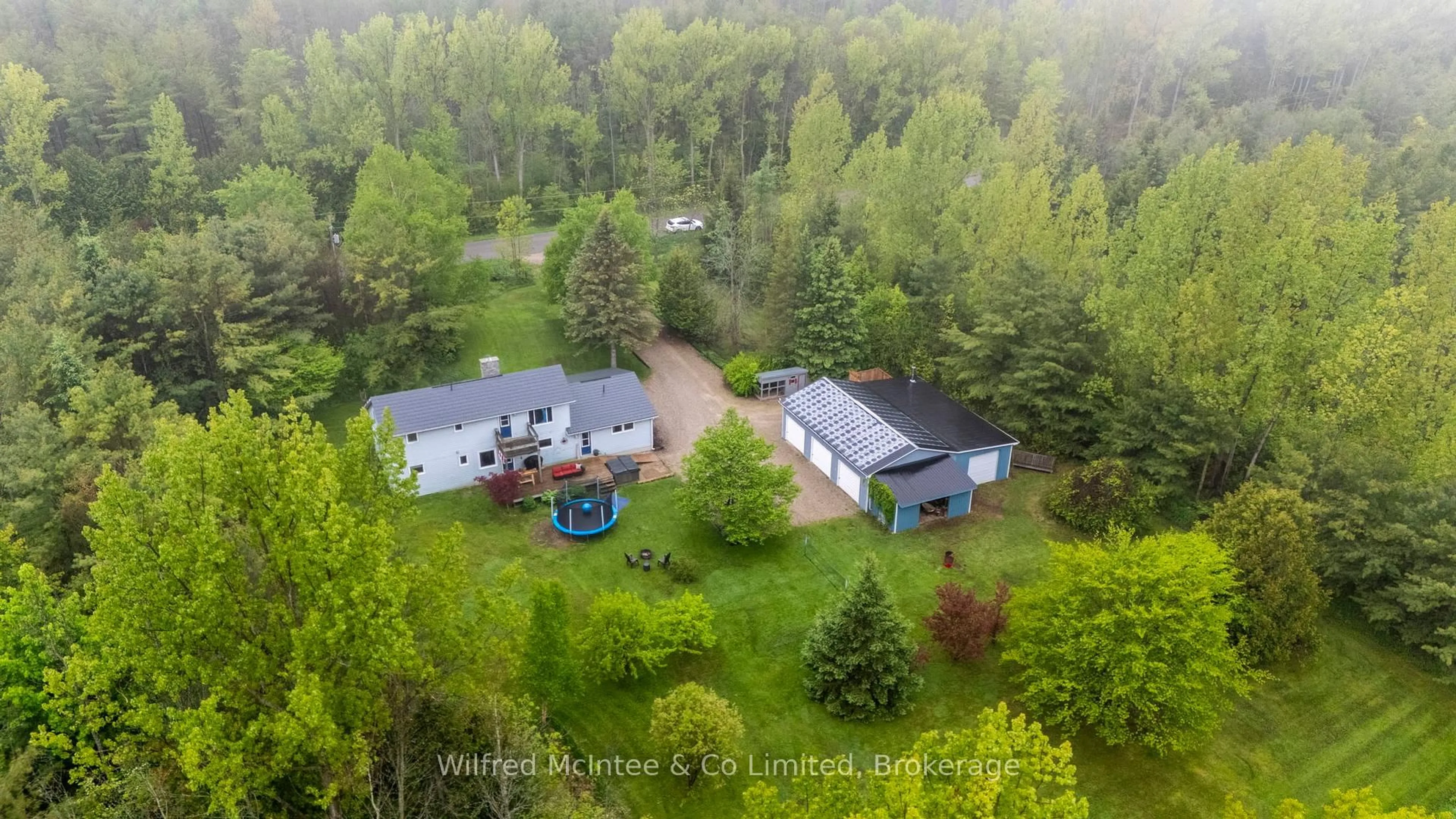 A pic from outside/outdoor area/front of a property/back of a property/a pic from drone, forest/trees view for 1716 Concession 10 Concession, Kincardine Ontario N0H 2C5