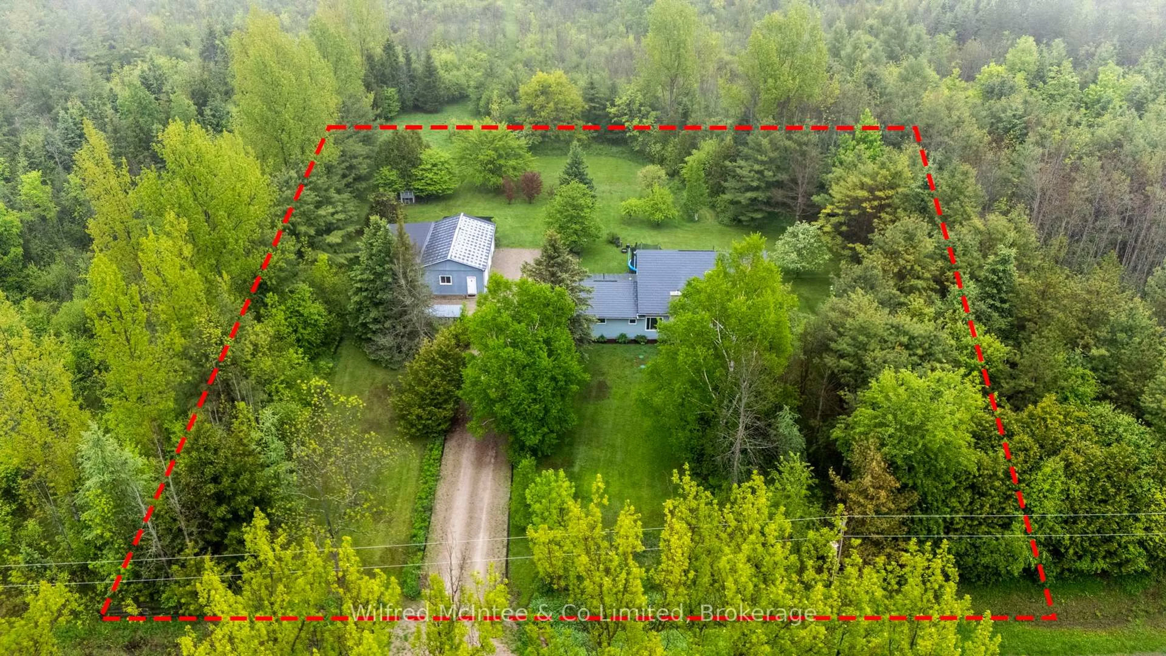 A pic from outside/outdoor area/front of a property/back of a property/a pic from drone, forest/trees view for 1716 Concession 10 Concession, Kincardine Ontario N0H 2C5