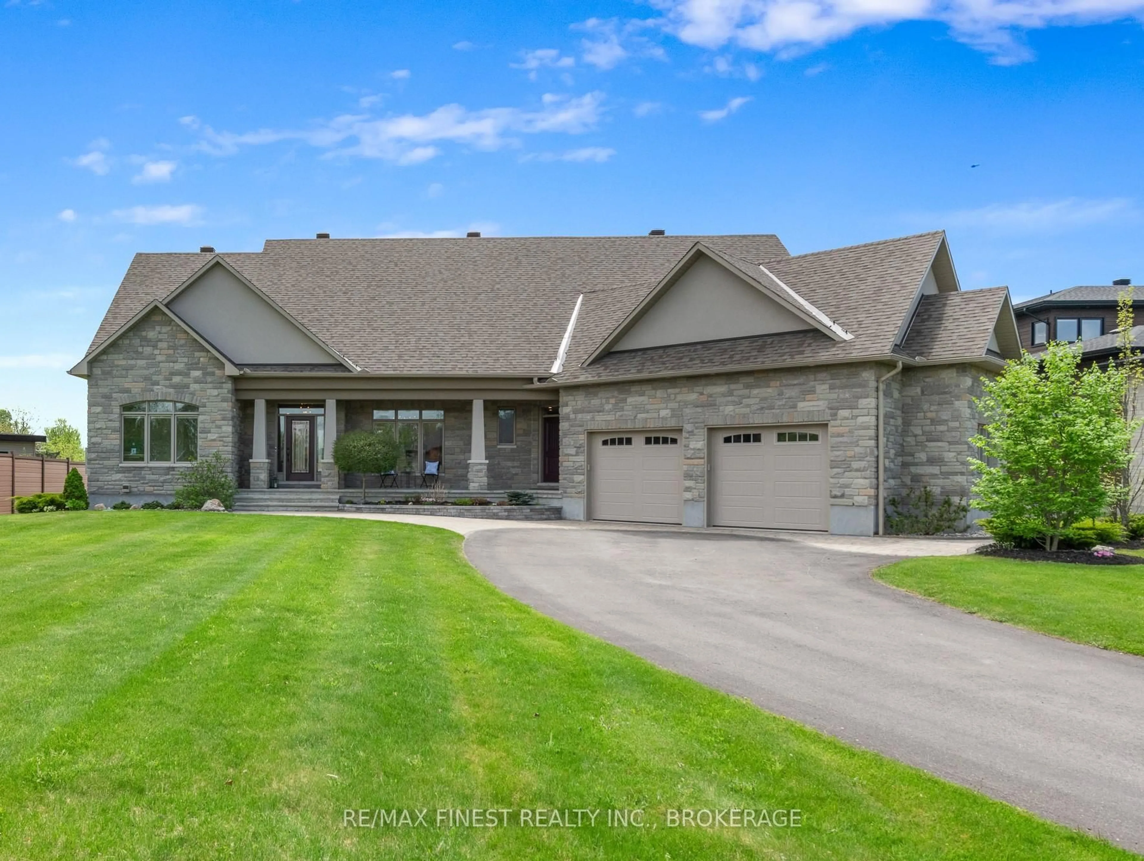 Home with brick exterior material, street for 717 McManus Ave, Manotick Ontario K4M 0B2