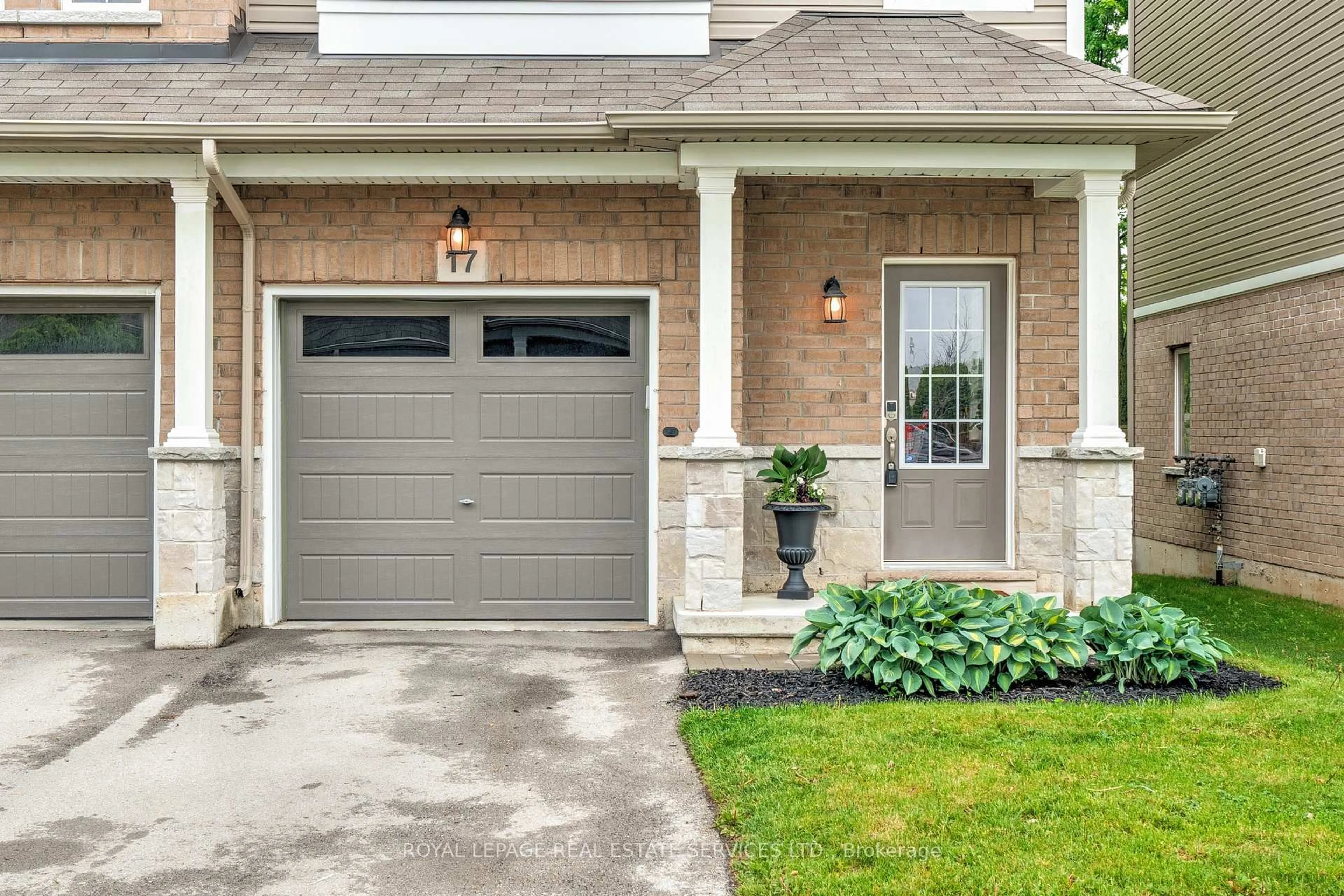 Home with brick exterior material, street for 122 Dundas St #17, Hamilton Ontario L9H 7N3