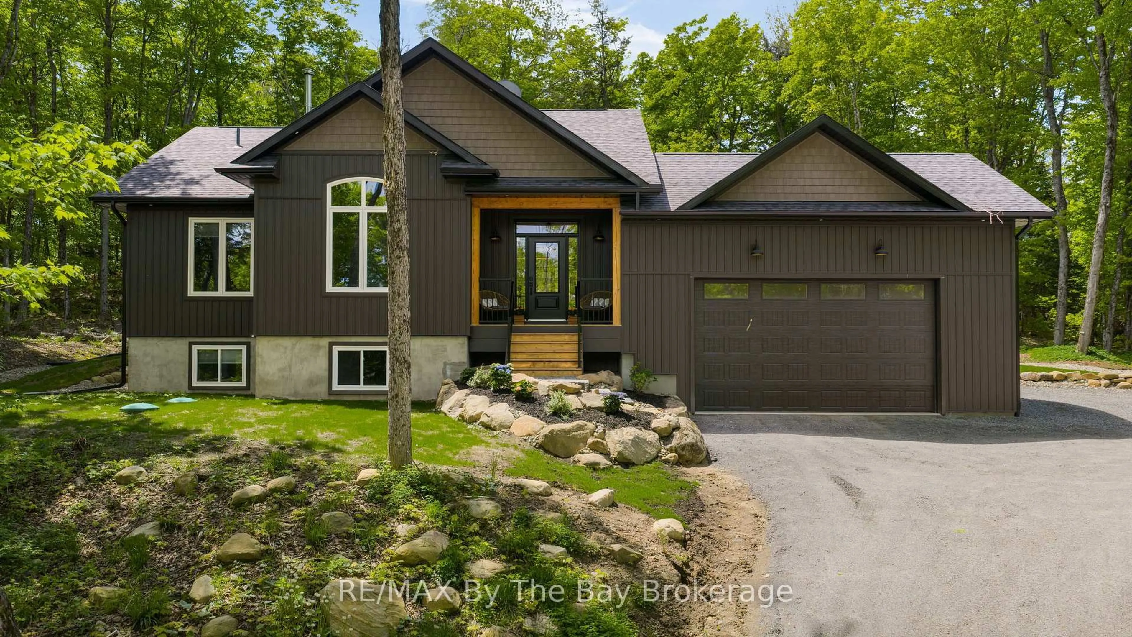 Home with brick exterior material, street for 76 Old Aspdin Rd, Huntsville Ontario P0B 1M0