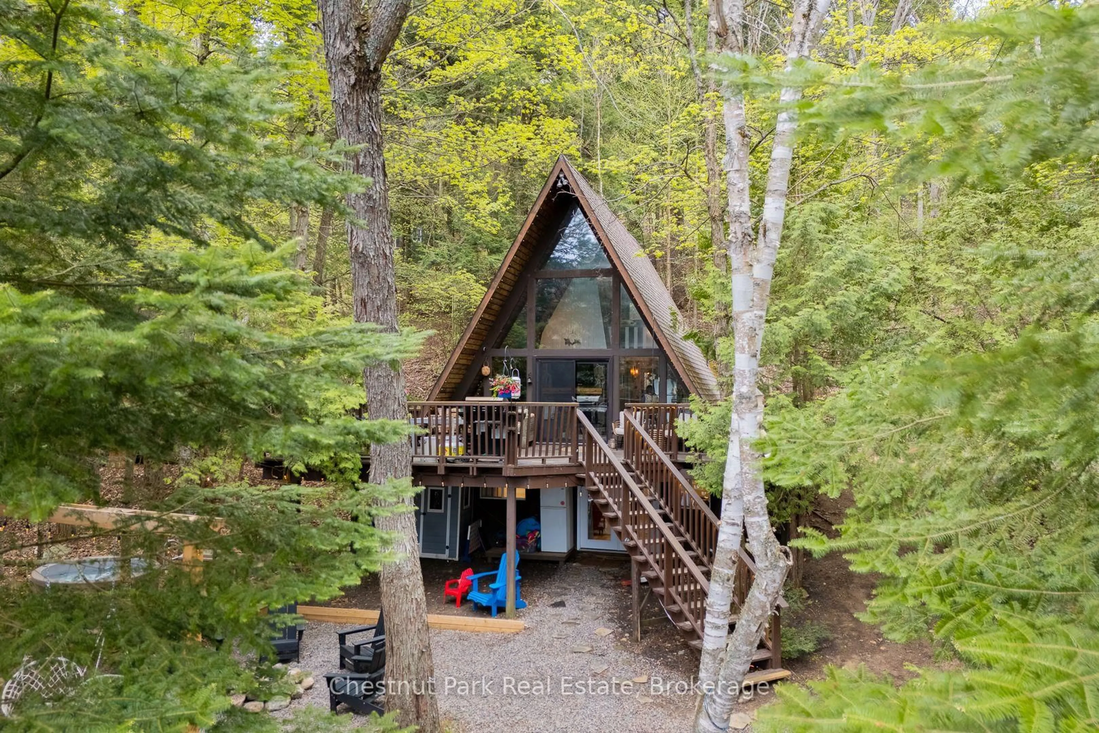 A pic from outside/outdoor area/front of a property/back of a property/a pic from drone, forest/trees view for 1499 Kennaway Rd, Dysart et al Ontario K0M 1S0