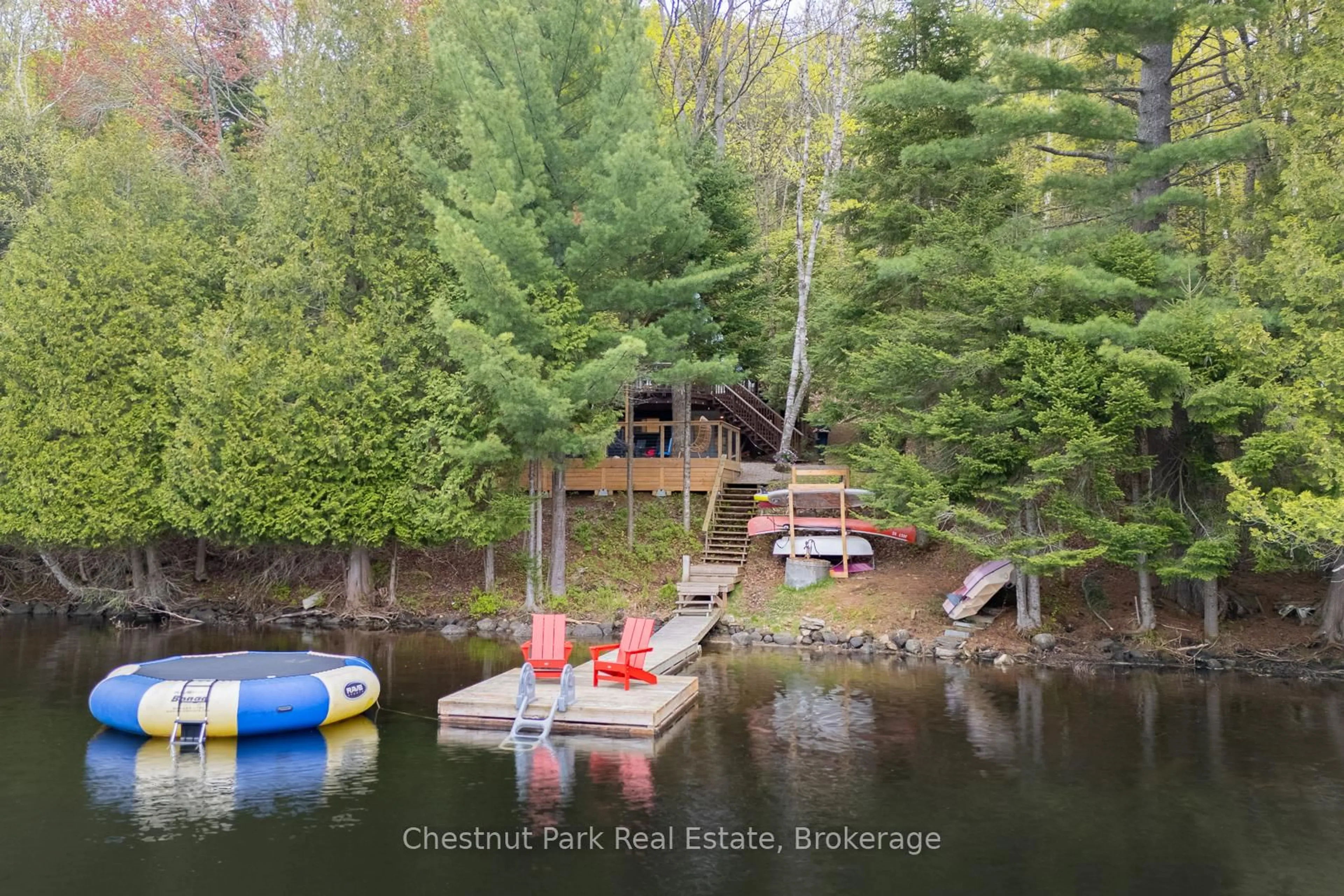 A pic from outside/outdoor area/front of a property/back of a property/a pic from drone, water/lake/river/ocean view for 1499 Kennaway Rd, Dysart et al Ontario K0M 1S0