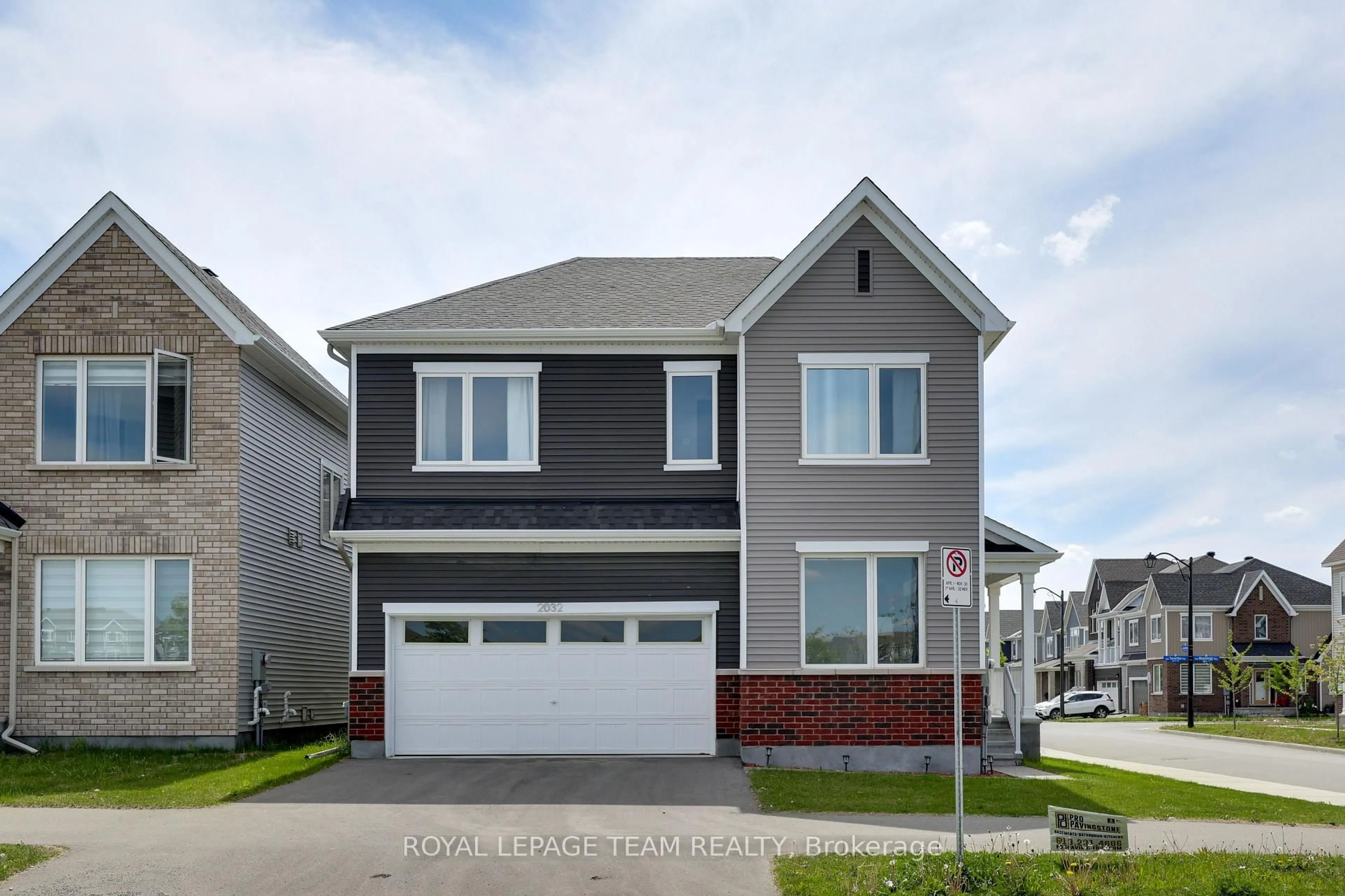 Home with vinyl exterior material, street for 2032 Elevation Rd, Ottawa Ontario K2J 6X5