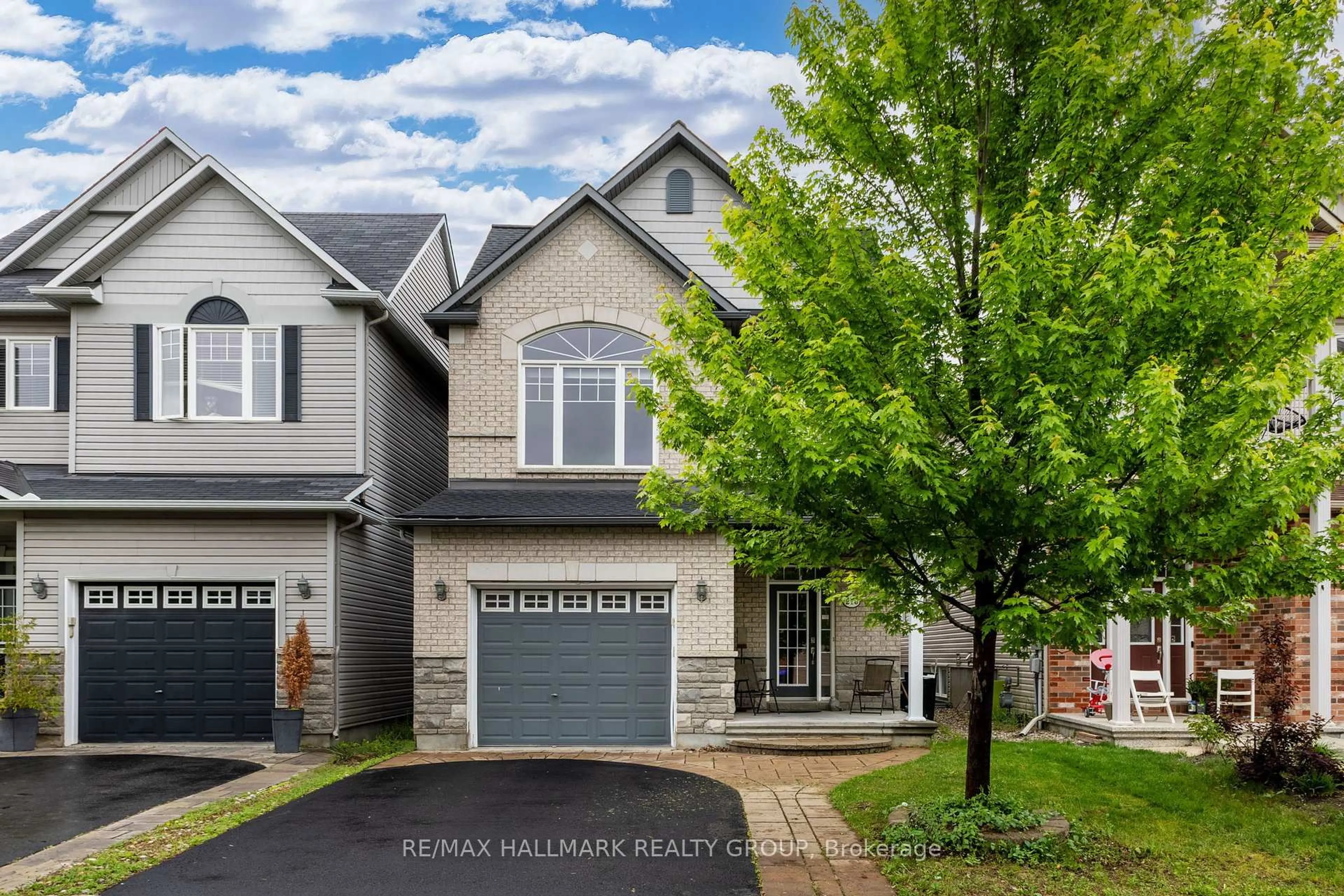 Home with brick exterior material, street for 210 Broxburn Cres, Nepean Ontario K2J 0N7