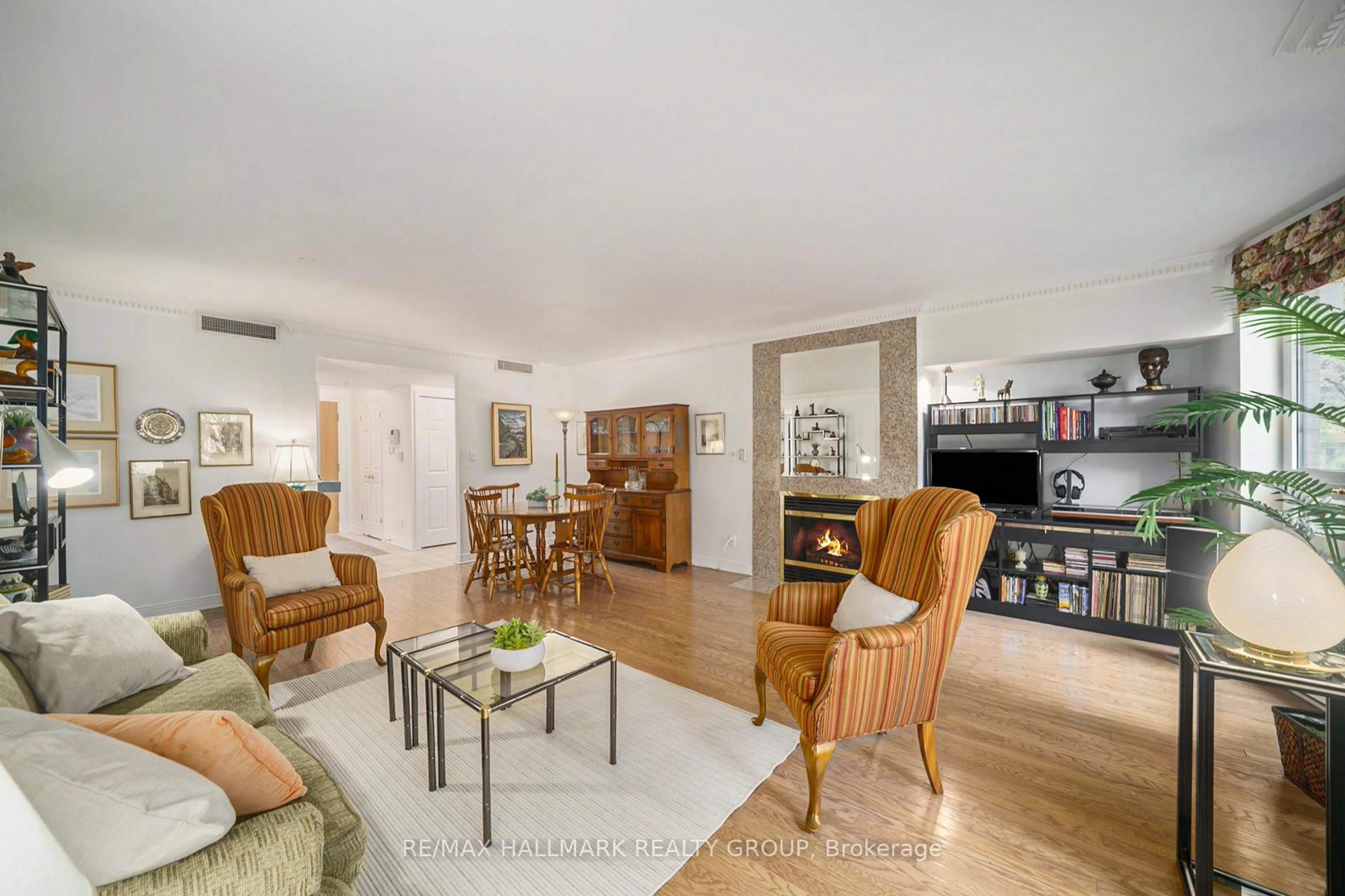 Living room with furniture, unknown for 3099 Carling Ave #108, Ottawa Ontario K2H 5A6