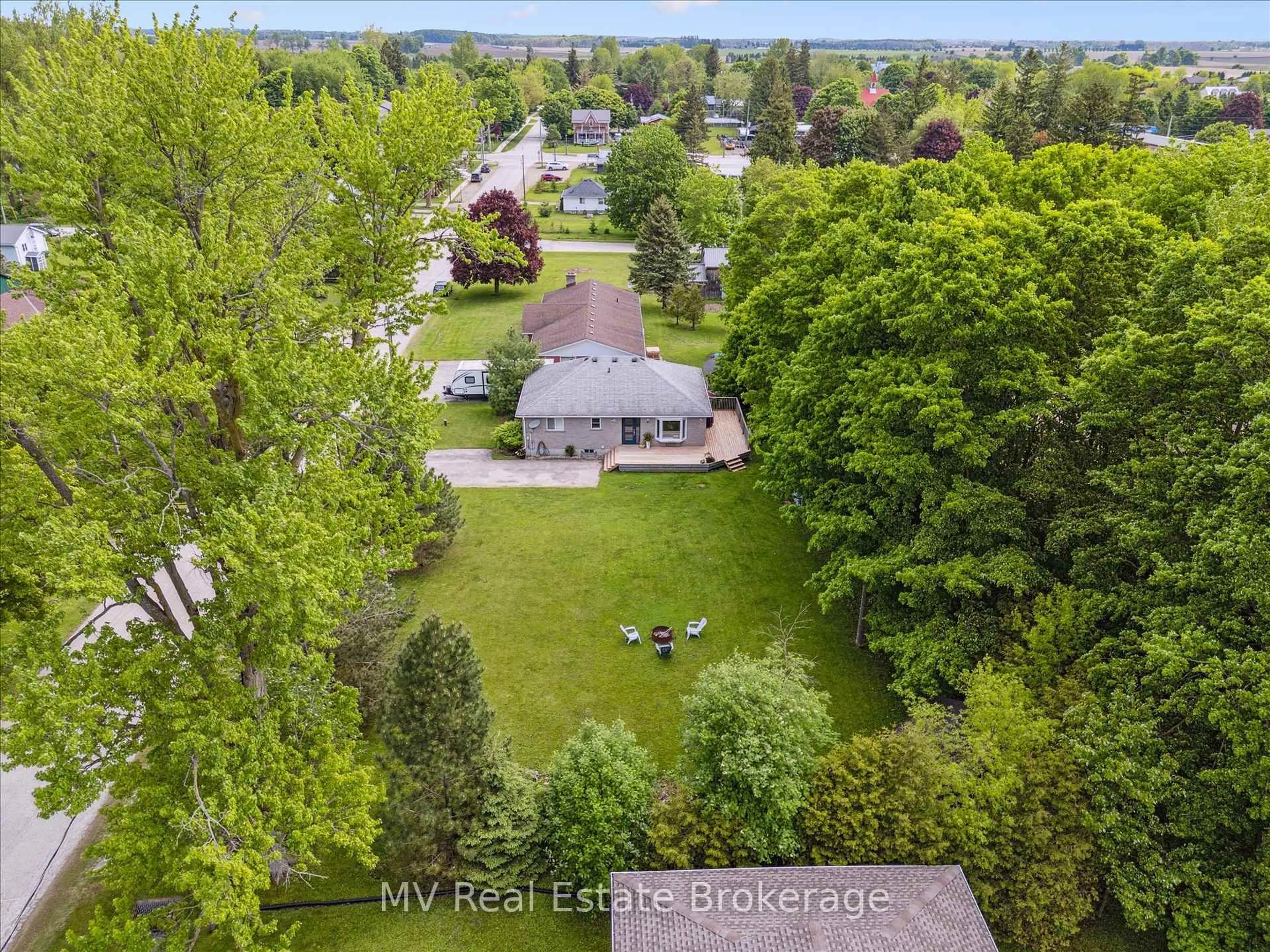 A pic from outside/outdoor area/front of a property/back of a property/a pic from drone, unknown for 25 Graham St, Mapleton Ontario N0B 1A0