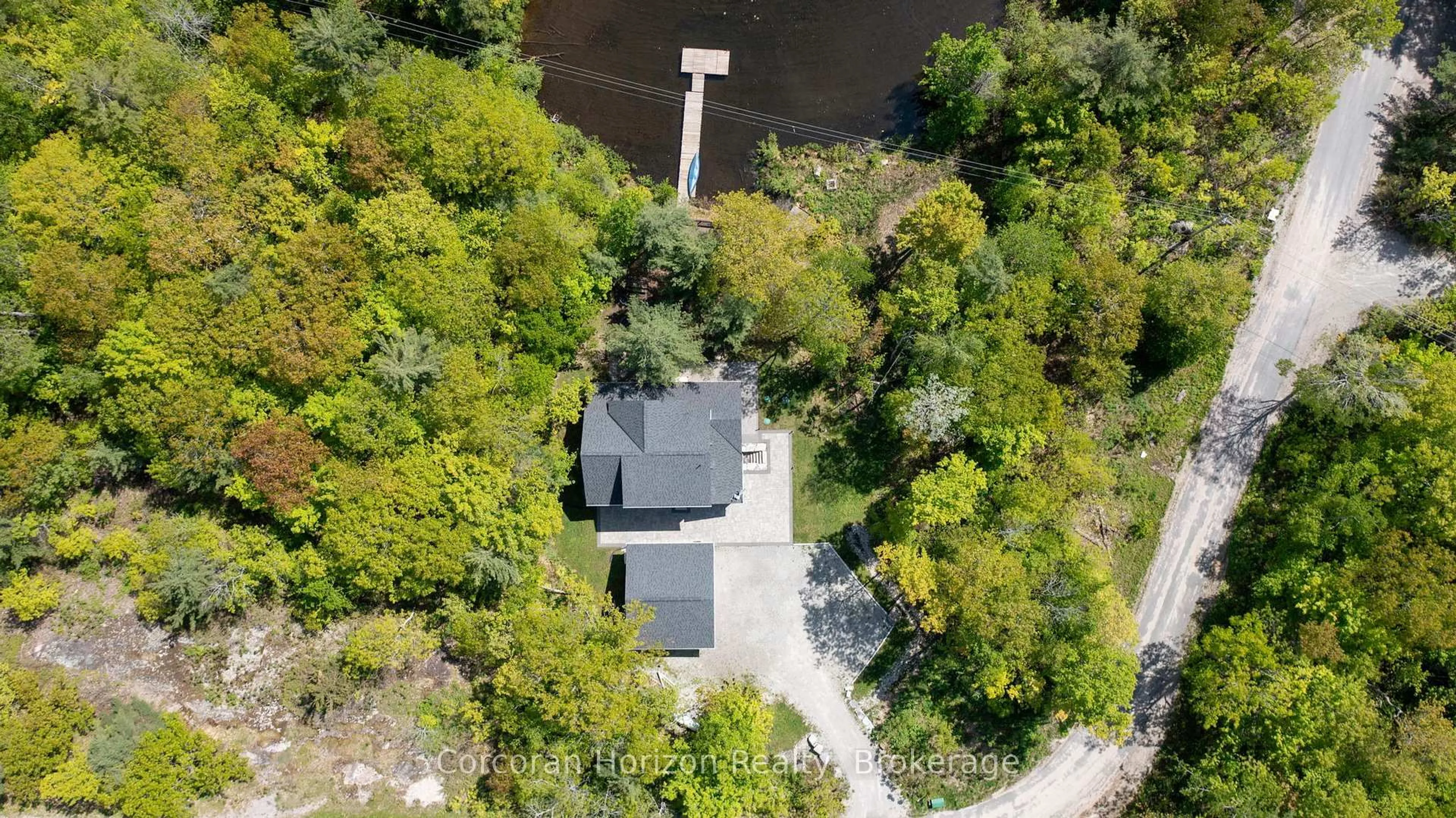 A pic from outside/outdoor area/front of a property/back of a property/a pic from drone, water/lake/river/ocean view for 450 Crooked Bay Rd, Georgian Bay Ontario P0C 1S0