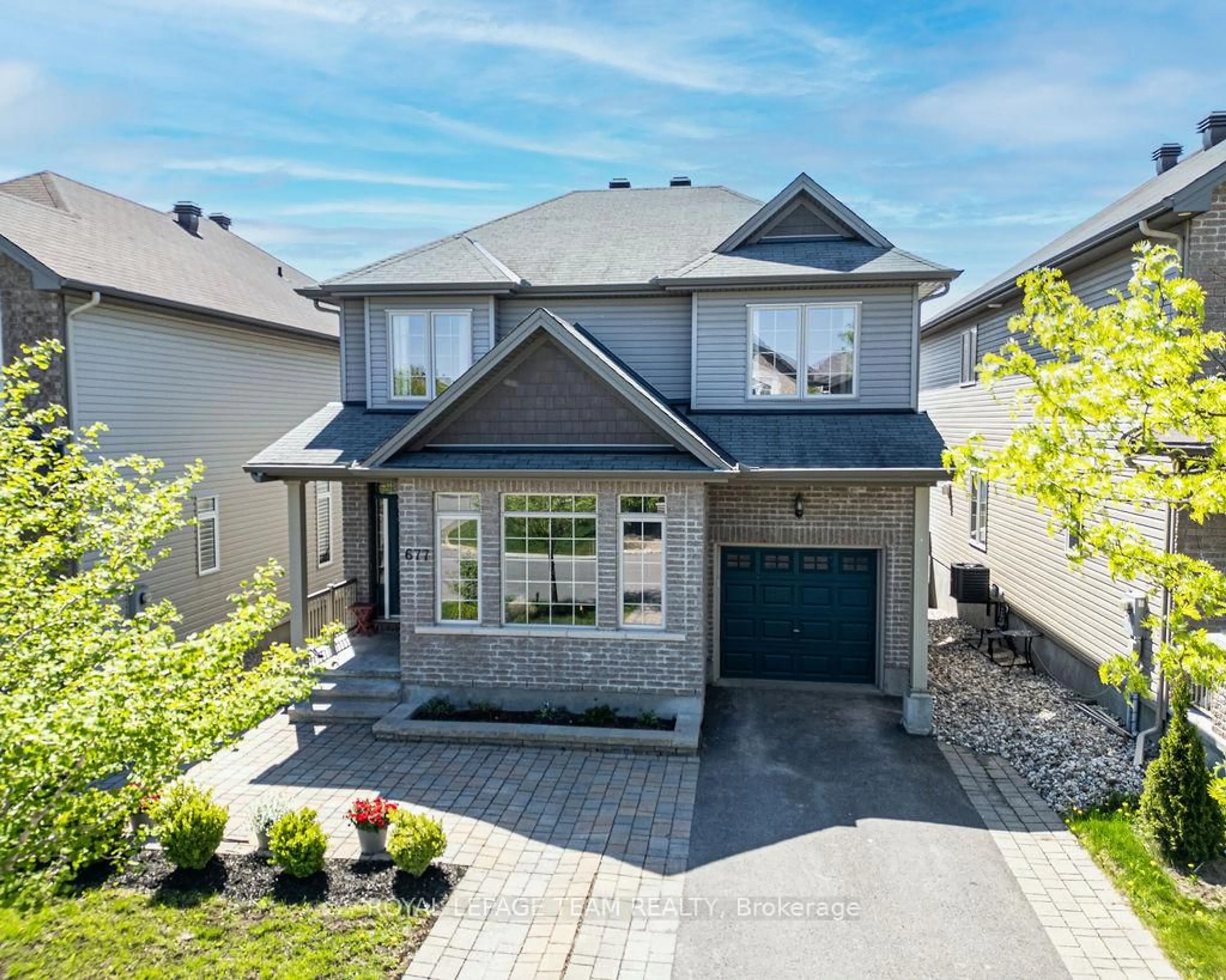 Home with brick exterior material, street for 677 SUNBURST St, Ottawa Ontario K1T 0L2