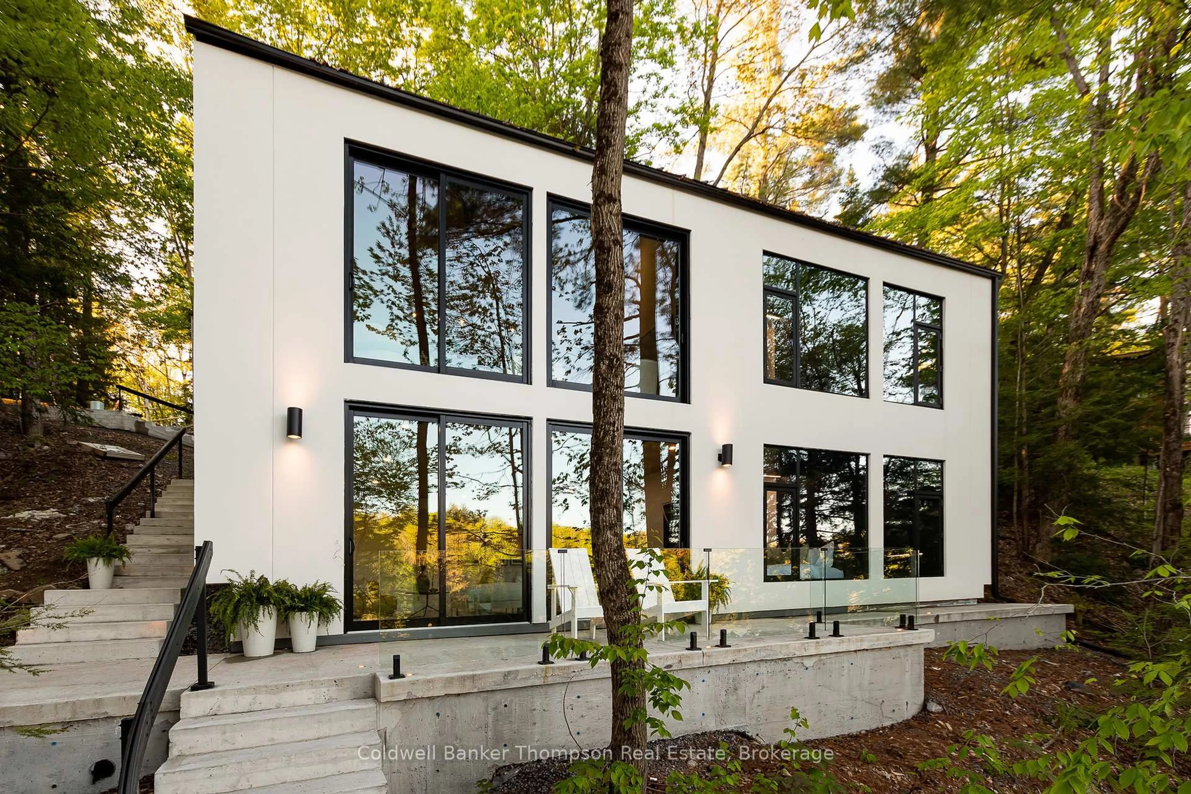 Home with brick exterior material, forest/trees view for 1036 Carlson Pl, Bracebridge Ontario P1L 1X1