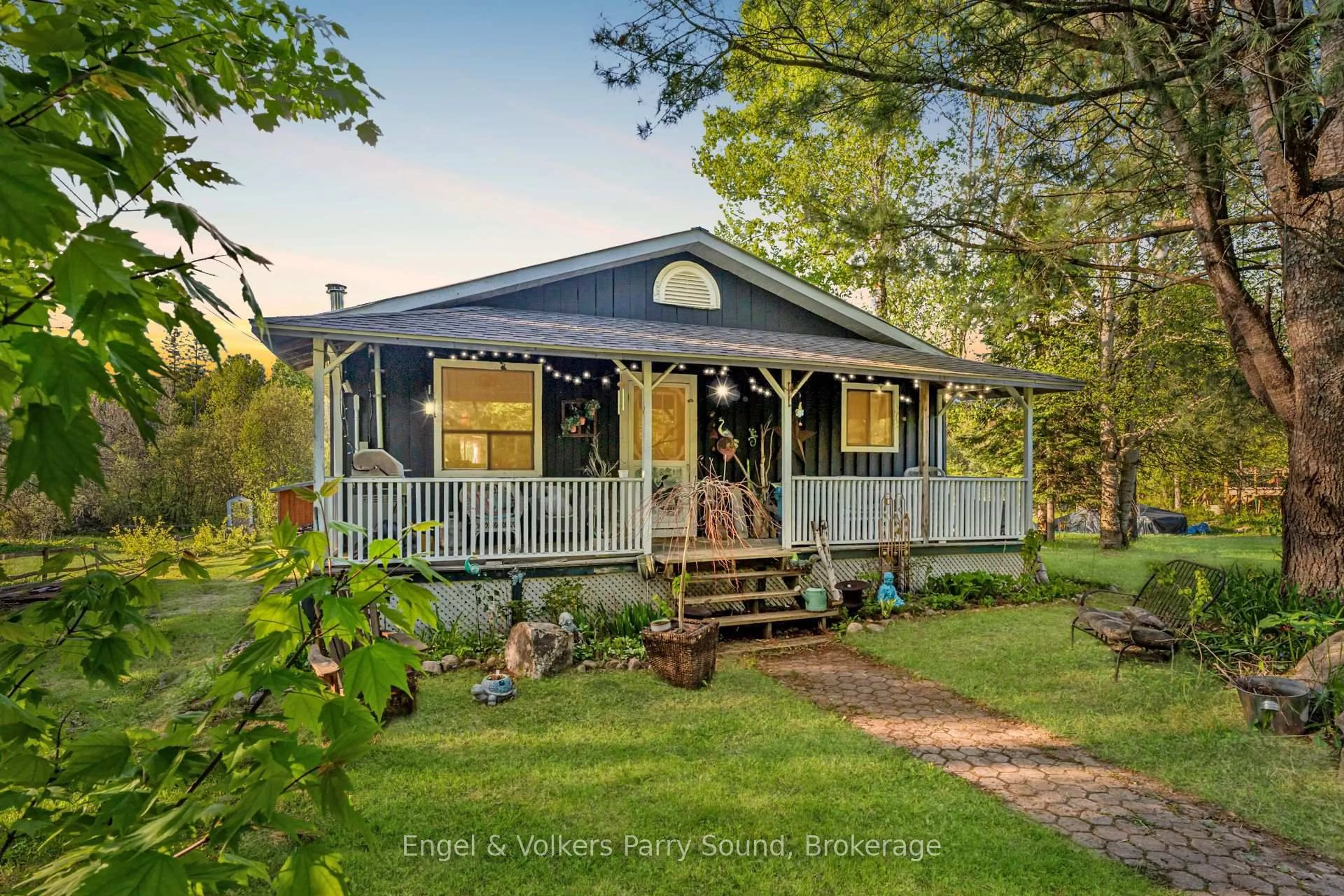 Home with vinyl exterior material, street for 34 Gordon Point Rd, Magnetawan Ontario P0A 1P0
