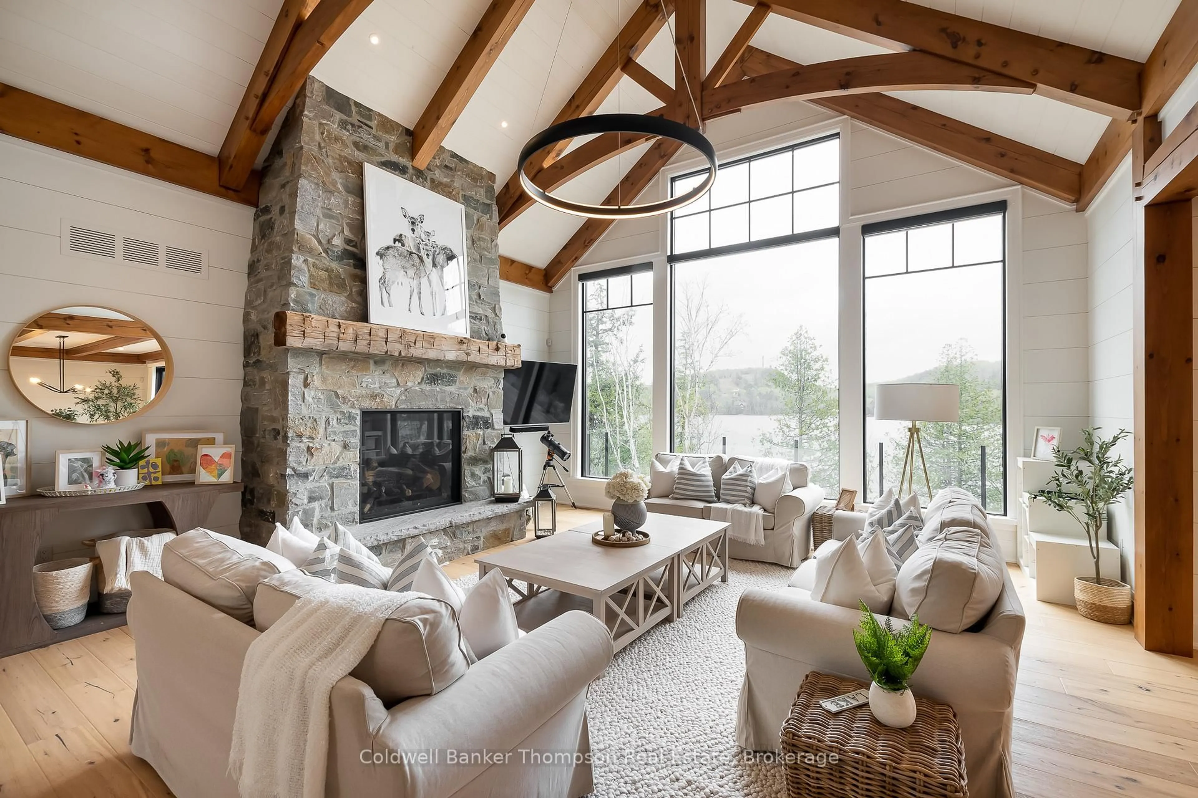 Living room with furniture, unknown for 414 Grassmere Resort Rd, Huntsville Ontario P1H 2J6