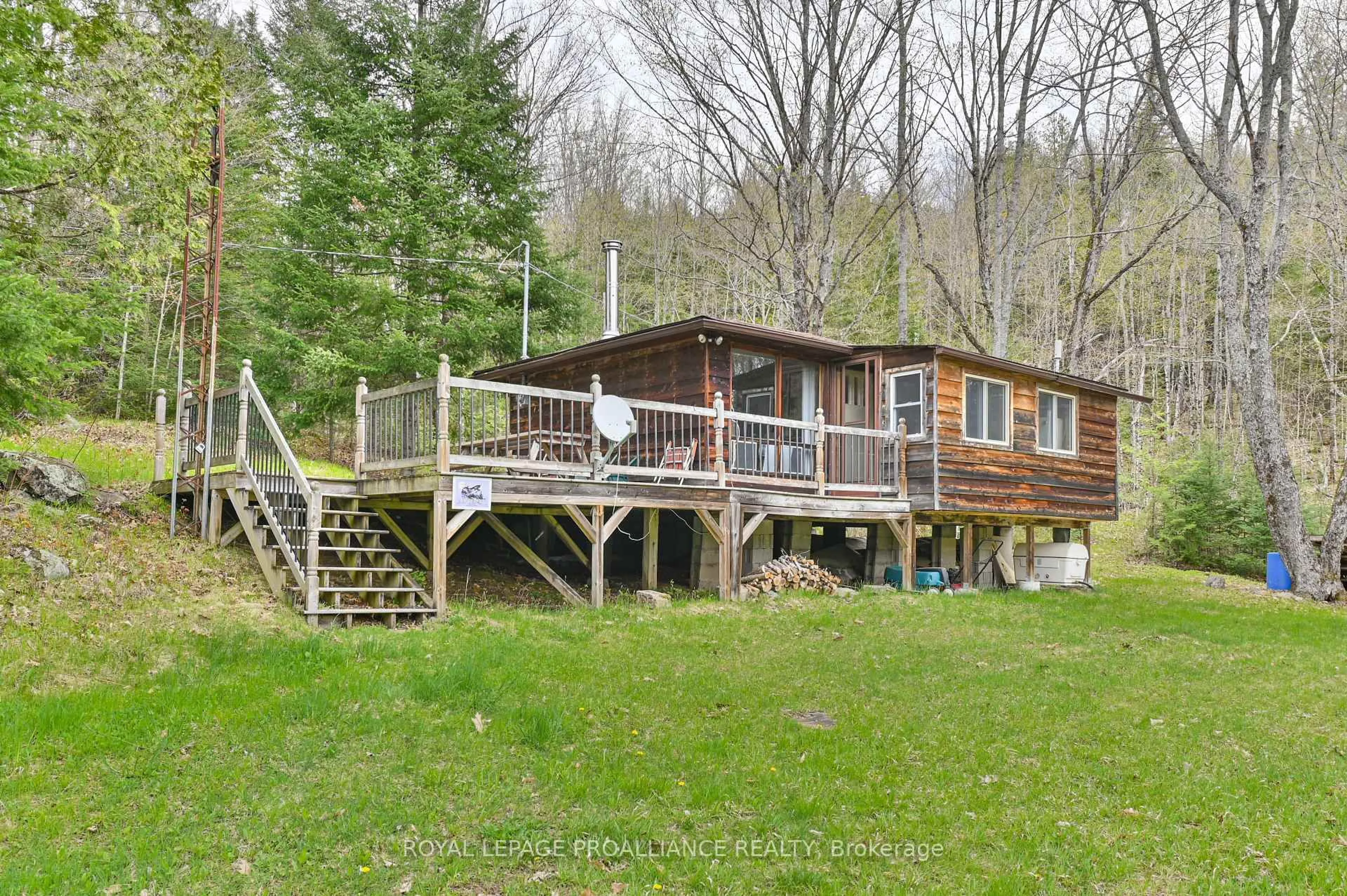 A pic from outside/outdoor area/front of a property/back of a property/a pic from drone, water/lake/river/ocean view for 2611 River Rd, Ompah Ontario K0H 2J0
