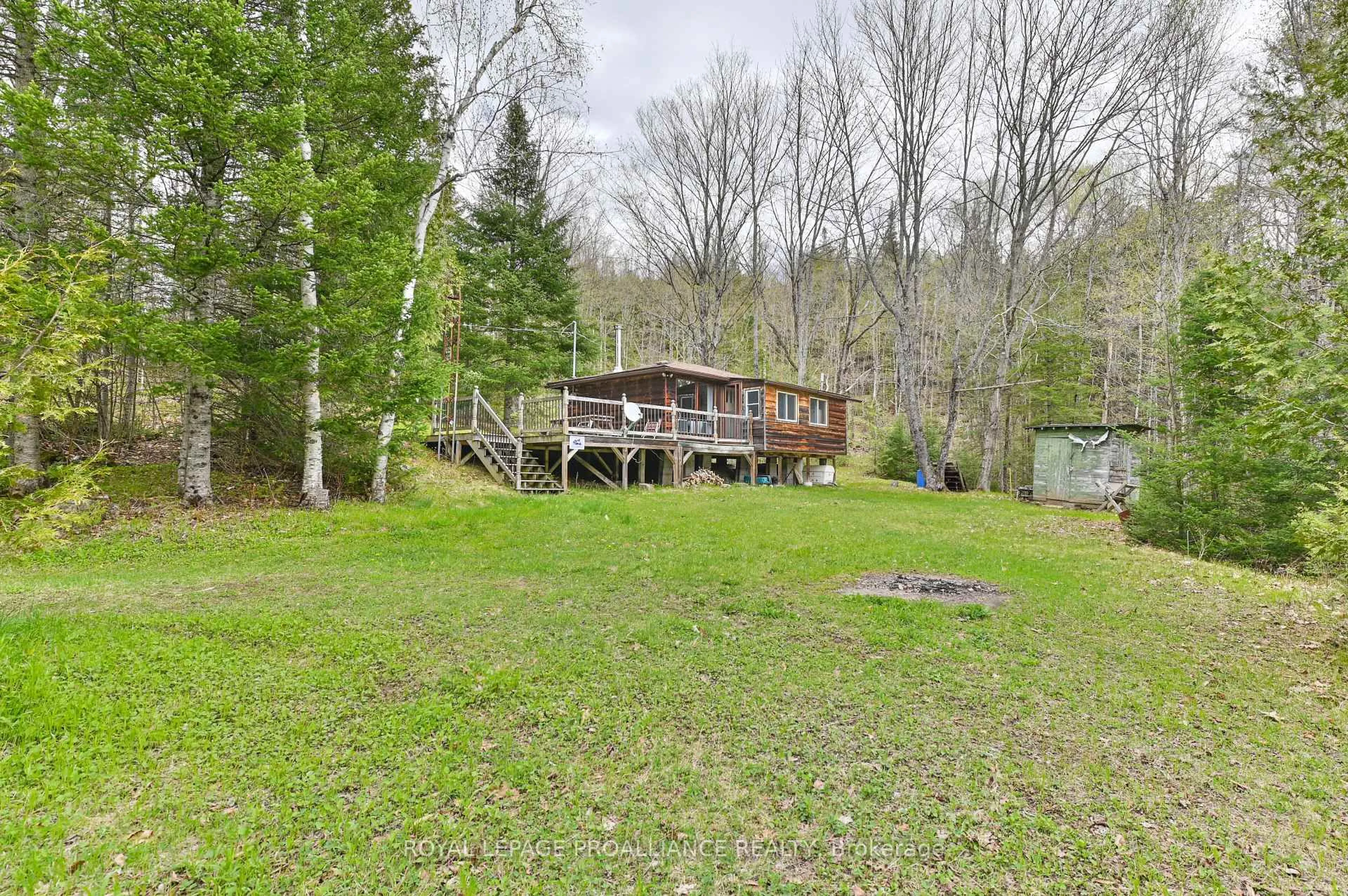 A pic from outside/outdoor area/front of a property/back of a property/a pic from drone, unknown for 2611 River Rd, Ompah Ontario K0H 2J0