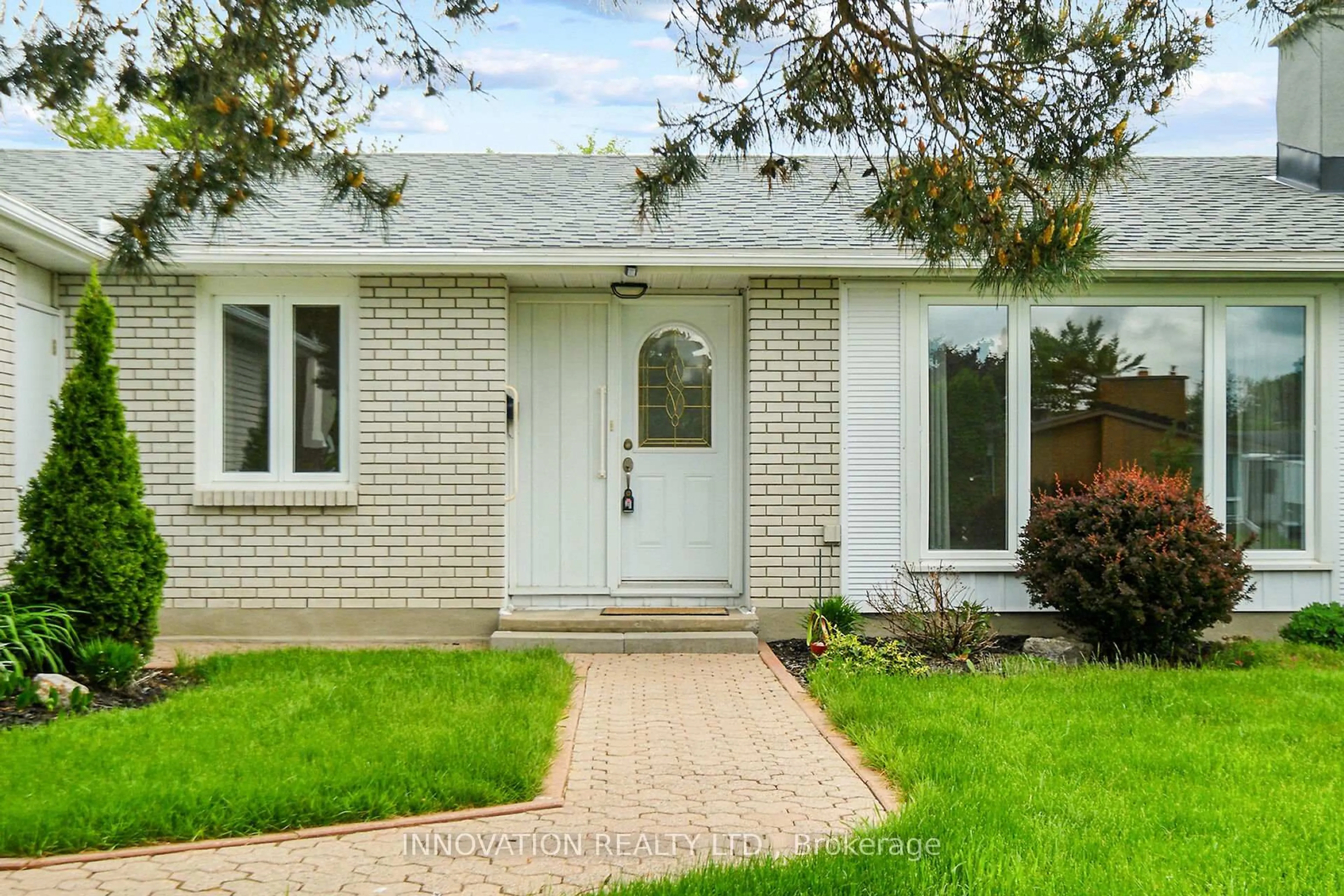 Home with brick exterior material, street for 1871 Greenacre Cres, Ottawa Ontario K1J 6S7