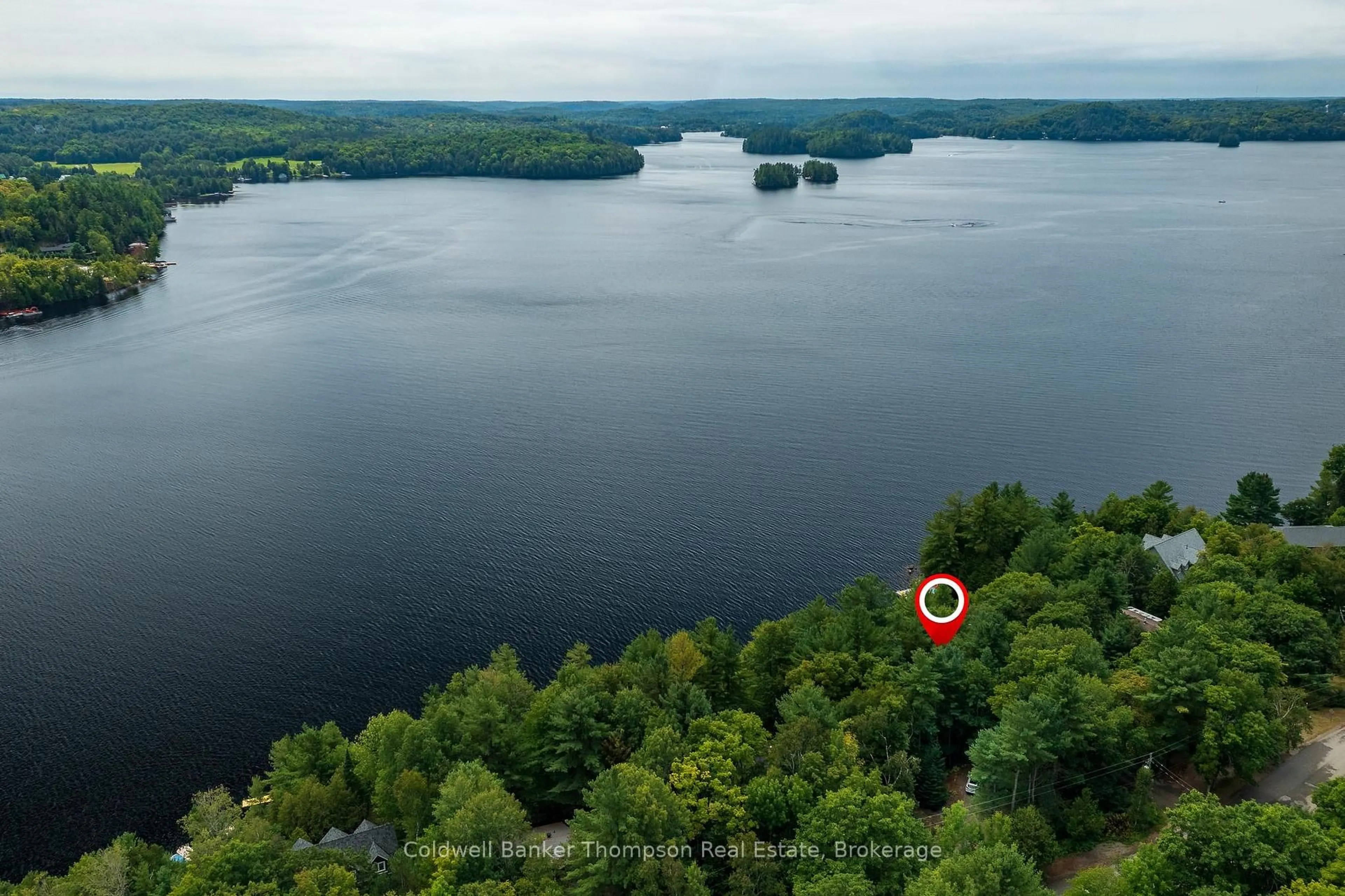 A pic from outside/outdoor area/front of a property/back of a property/a pic from drone, water/lake/river/ocean view for 148 GOLDEN PHEASANT Dr, Huntsville Ontario P1H 1B3