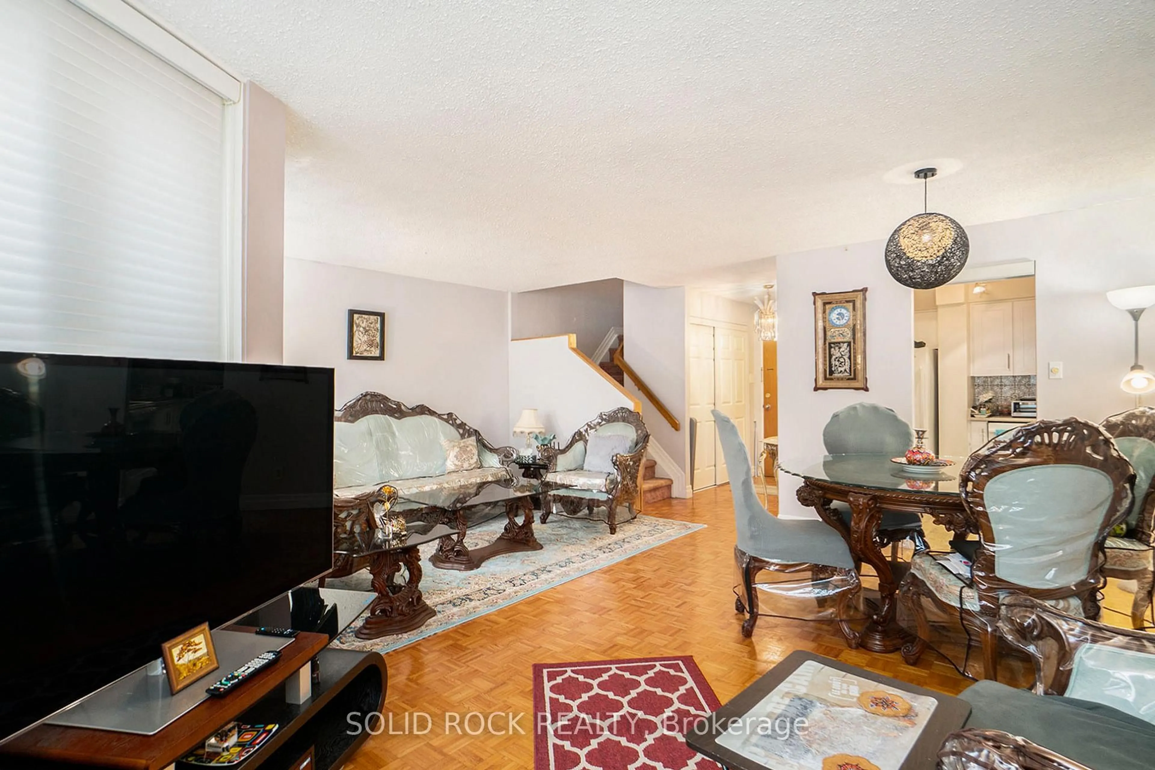 Living room with furniture, unknown for 2871 Richmond Rd #108, Ottawa Ontario K2B 8M5