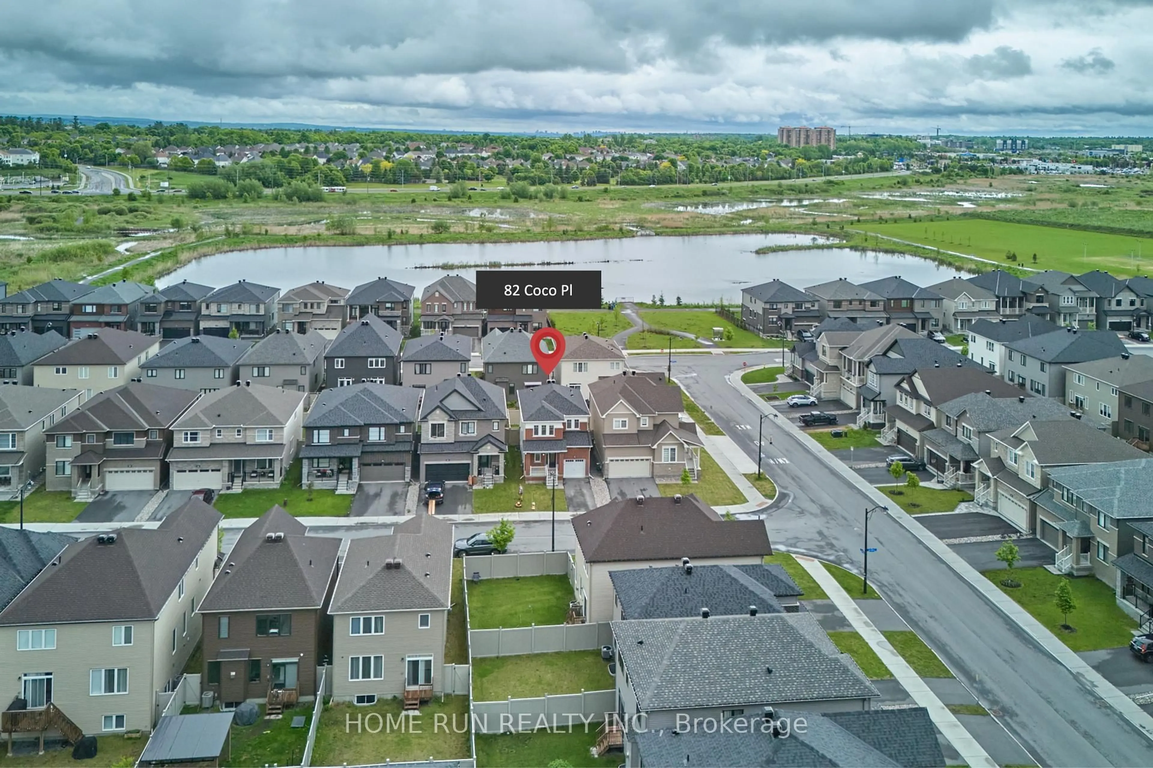 A pic from outside/outdoor area/front of a property/back of a property/a pic from drone, water/lake/river/ocean view for 82 COCO Pl, Ottawa Ontario K2T 0R2