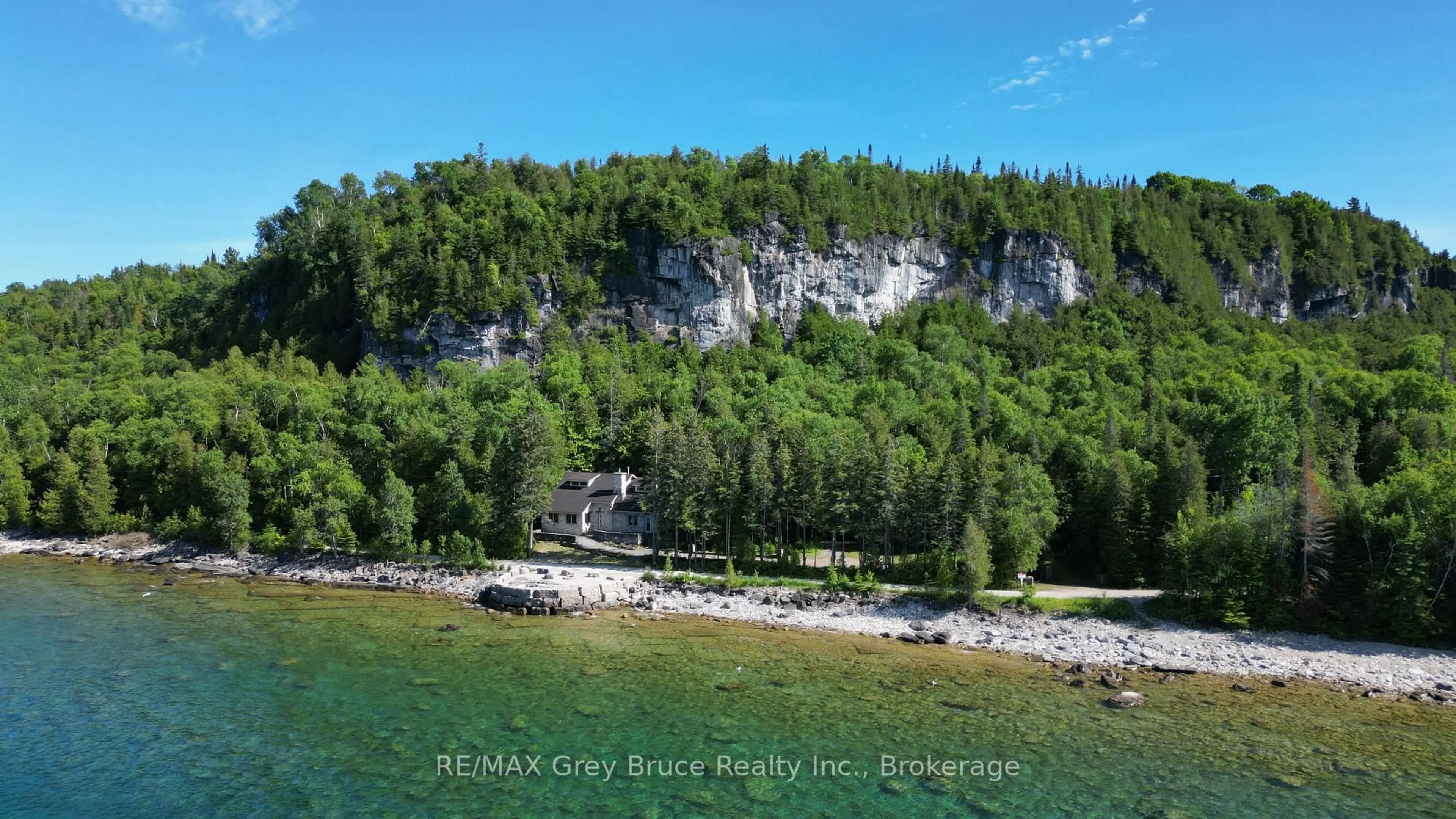 A pic from outside/outdoor area/front of a property/back of a property/a pic from drone, water/lake/river/ocean view for 130 South Shore Rd, Northern Bruce Peninsula Ontario N0H 1W0