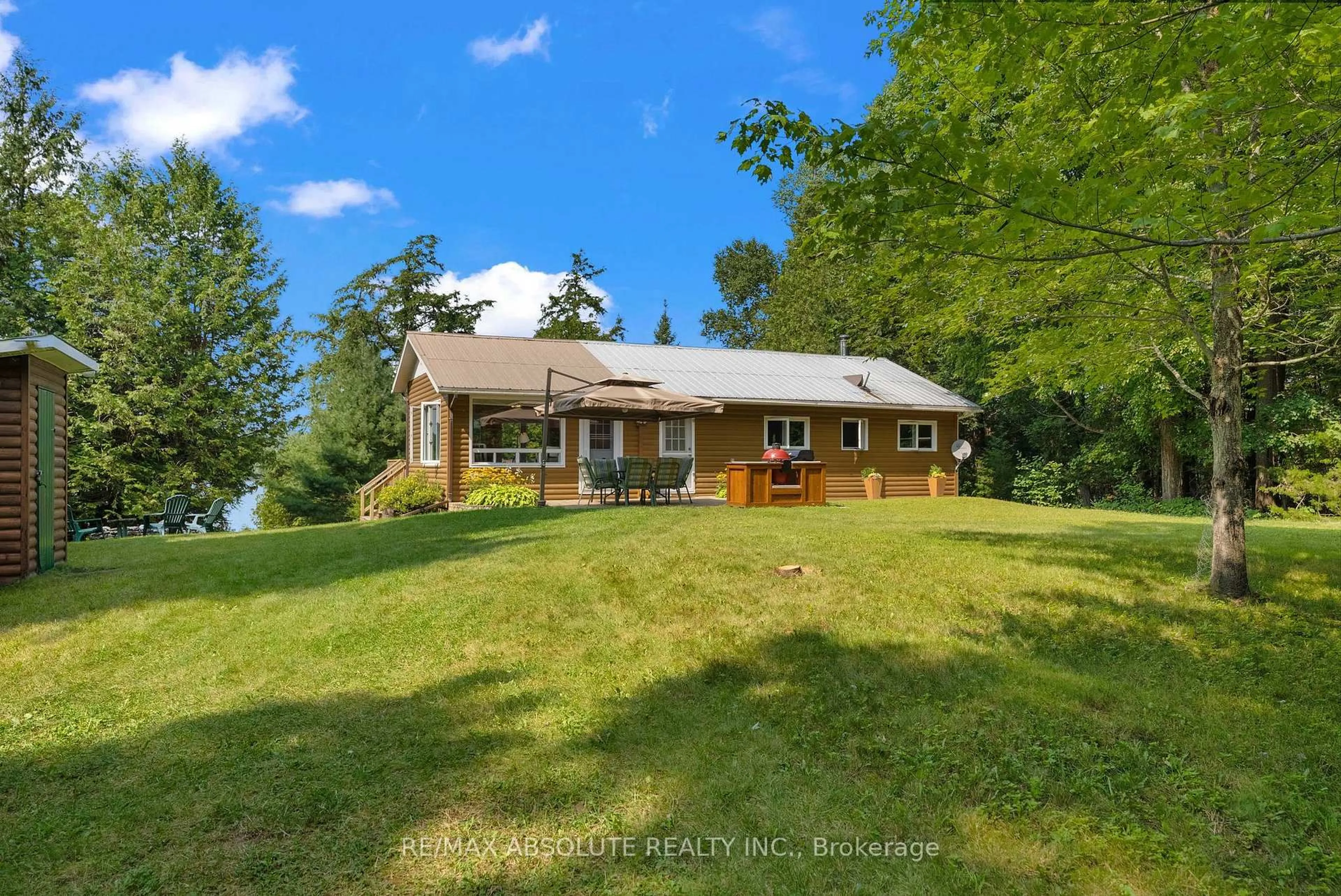 A pic from outside/outdoor area/front of a property/back of a property/a pic from drone, water/lake/river/ocean view for 1384 A Centennial Lake Rd, Clarendon Station Ontario K0H 1J0