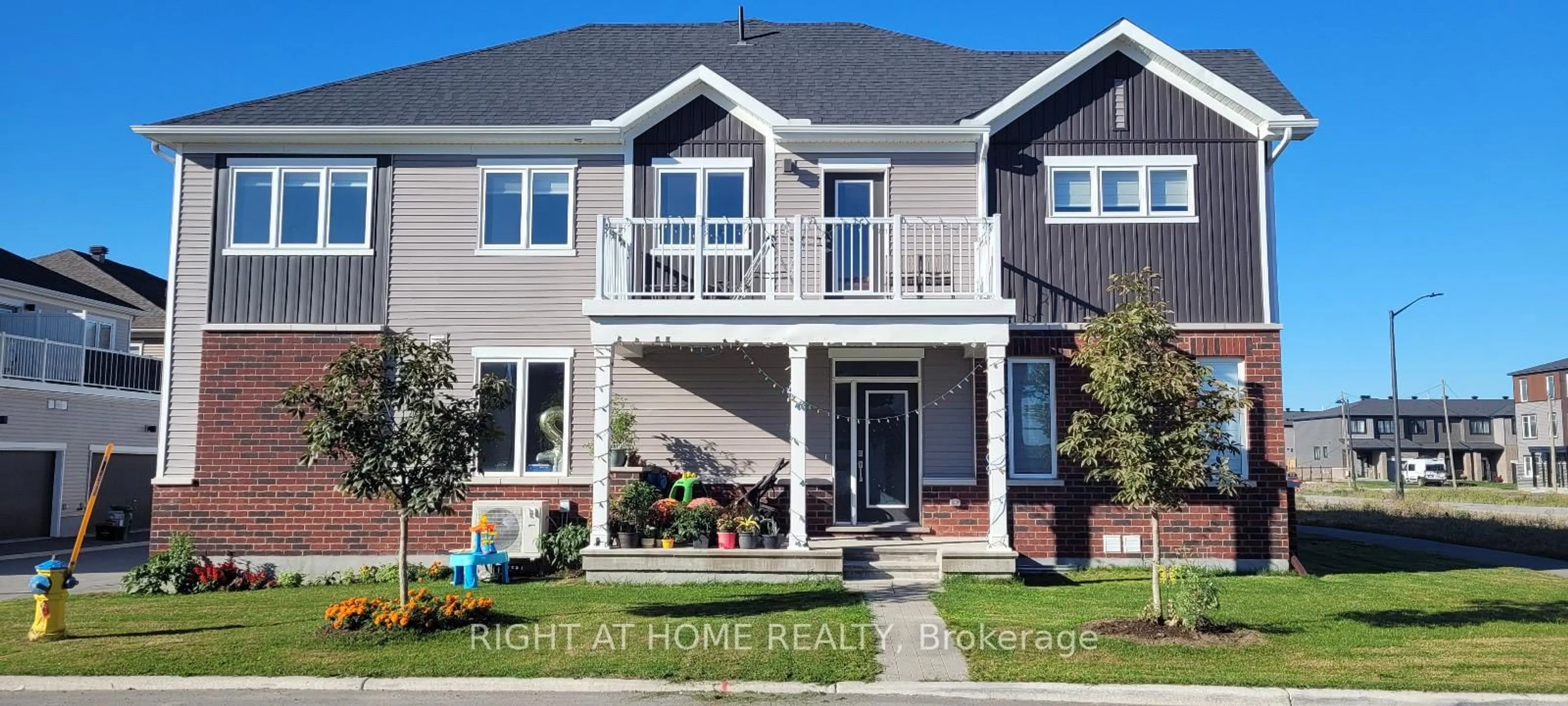 Home with brick exterior material, street for 1070 Chapman Mills Dr, Ottawa Ontario K2J 6P5