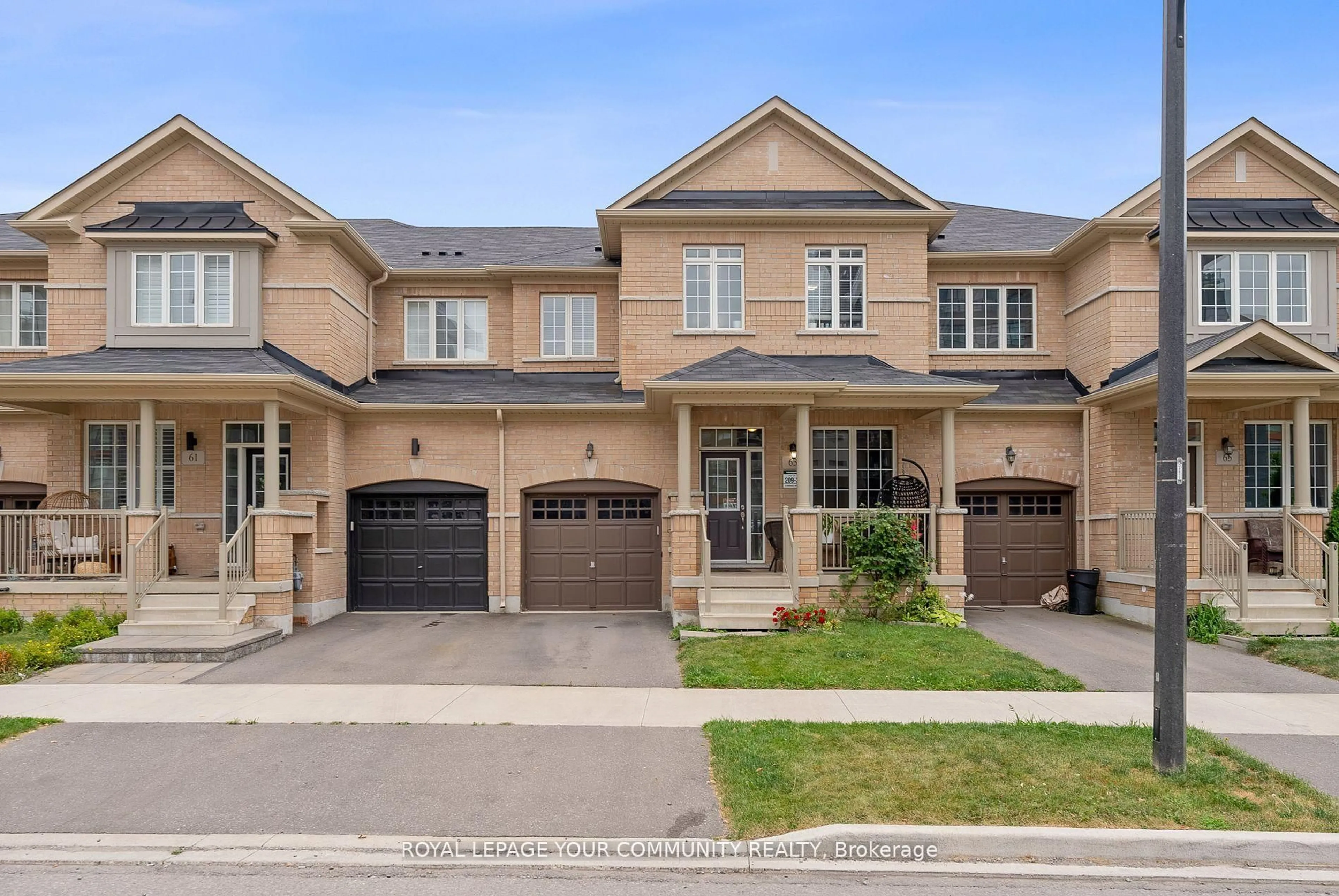 Home with brick exterior material, street for 63 Riverwalk Dr, Hamilton Ontario L8B 1X3
