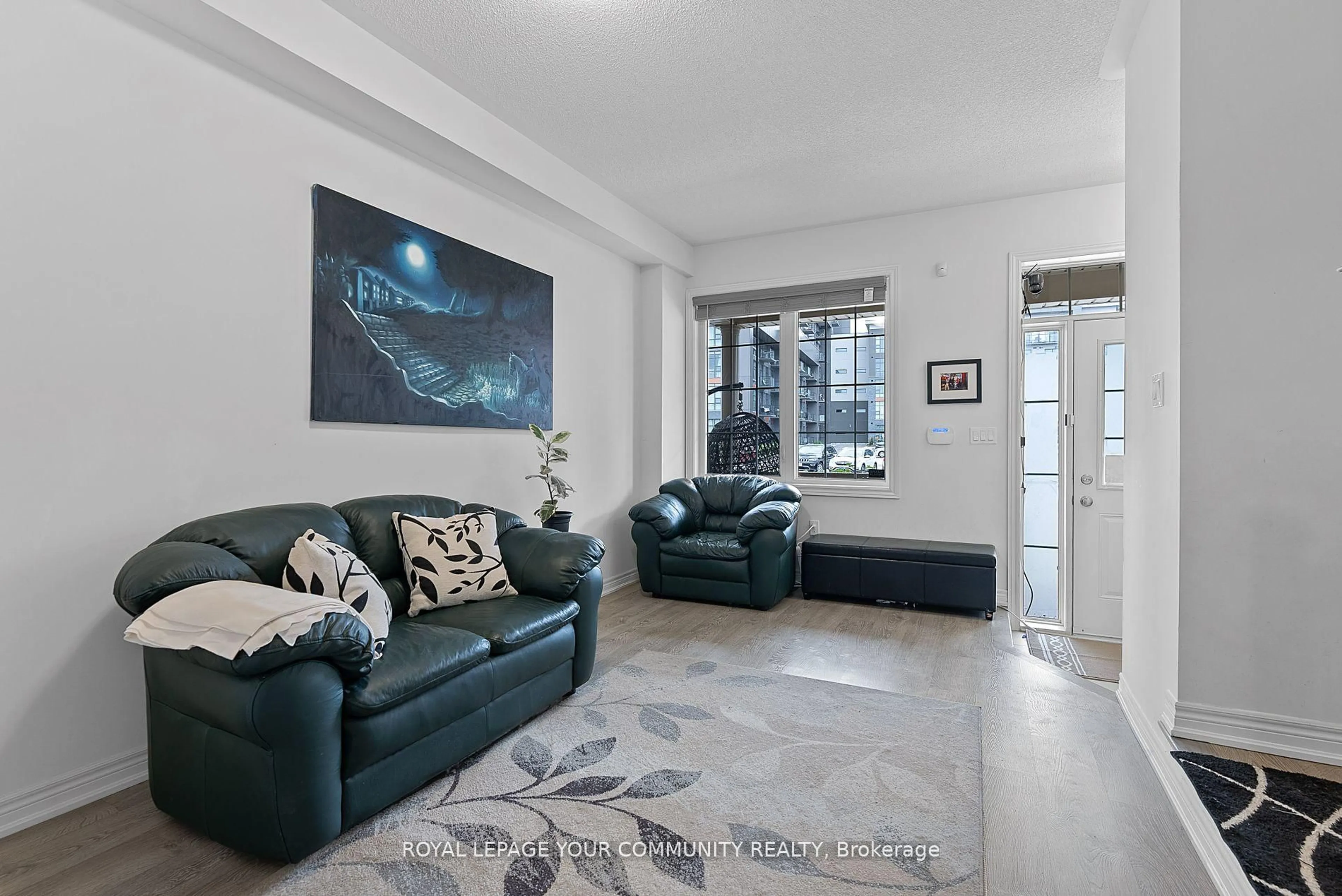 Living room with furniture, unknown for 63 Riverwalk Dr, Hamilton Ontario L8B 1X3