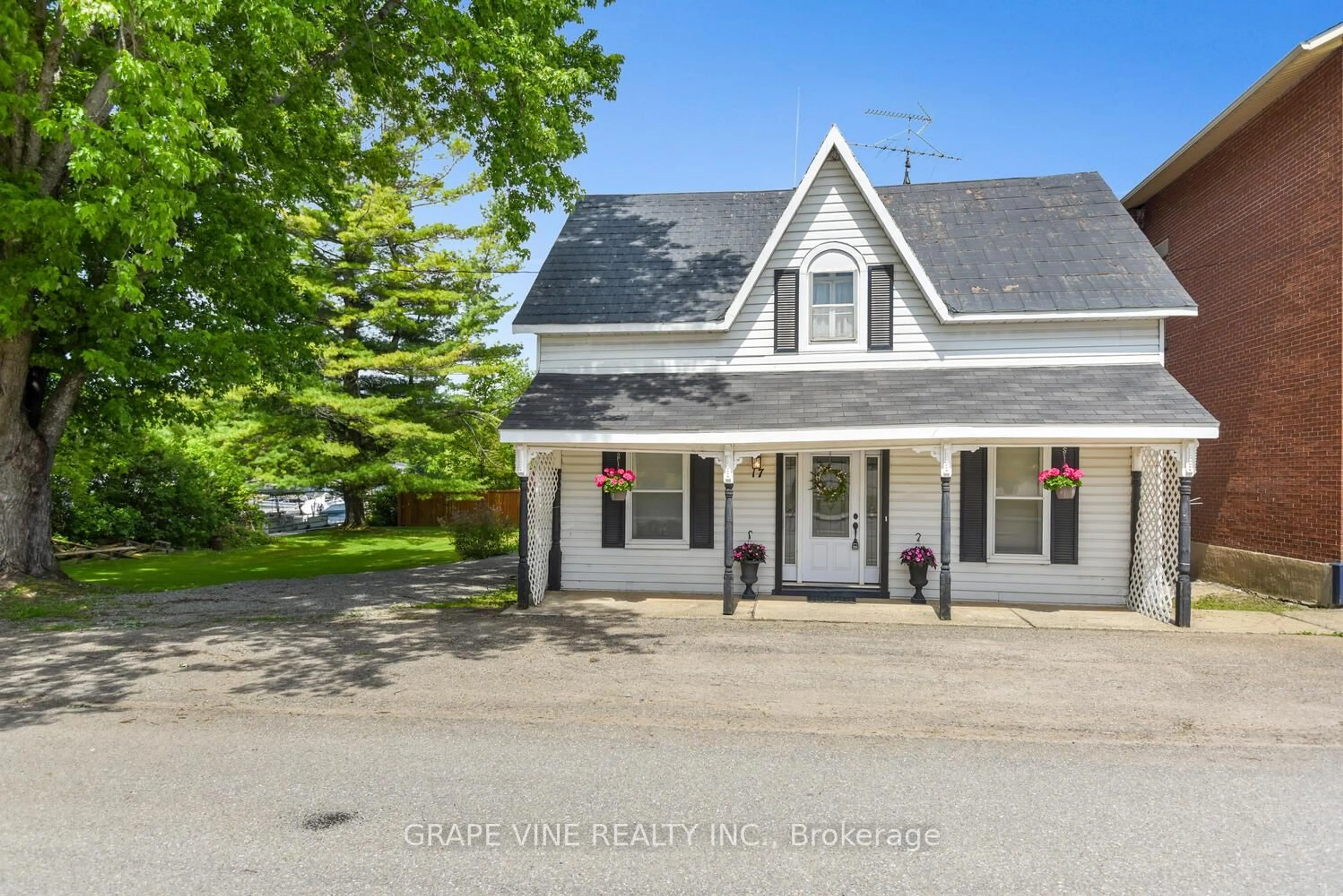 A pic from outside/outdoor area/front of a property/back of a property/a pic from drone, unknown for 17 Water St, Rideau Lakes Ontario K0G 1V0