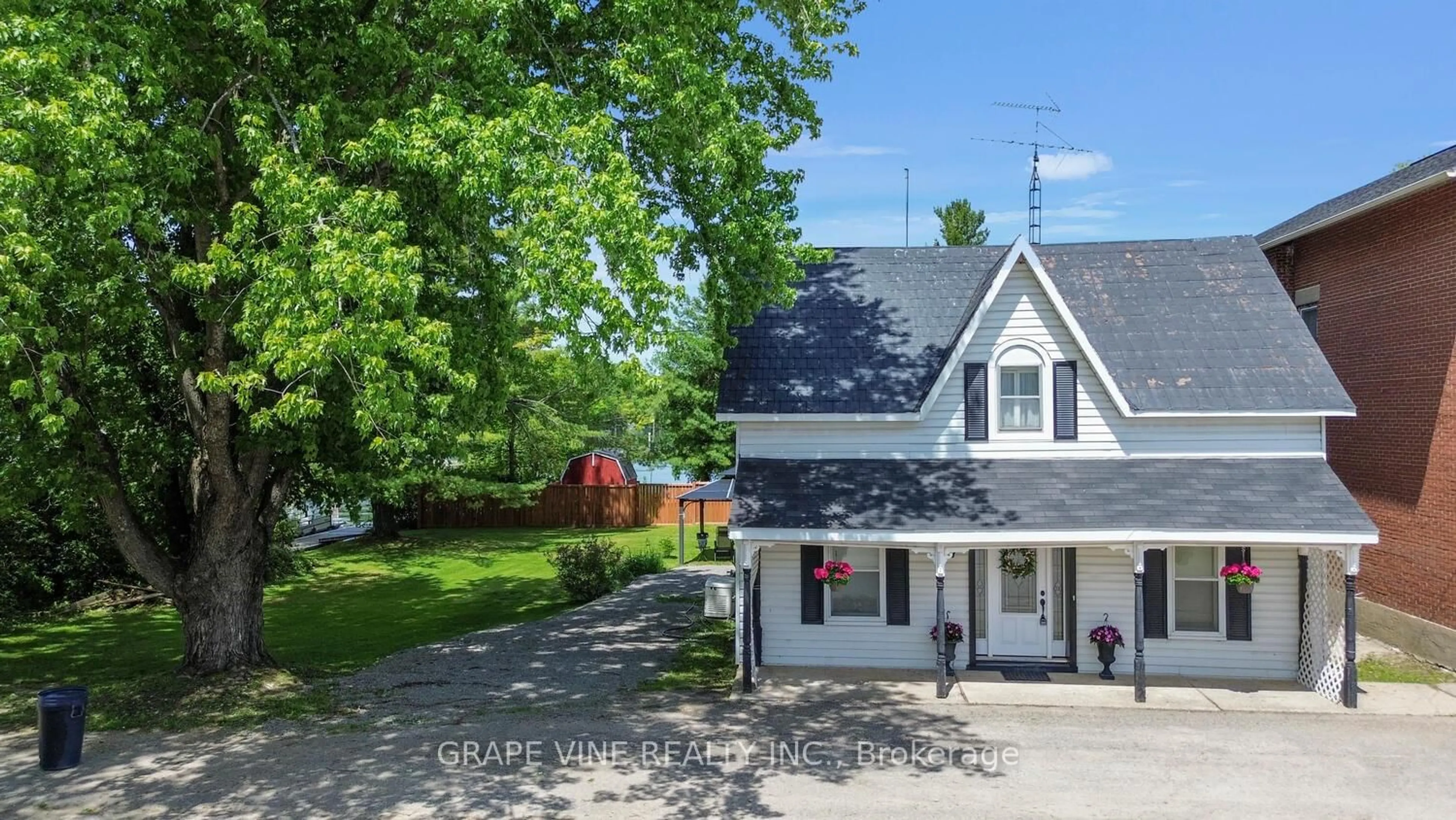 A pic from outside/outdoor area/front of a property/back of a property/a pic from drone, street for 17 Water St, Rideau Lakes Ontario K0G 1V0