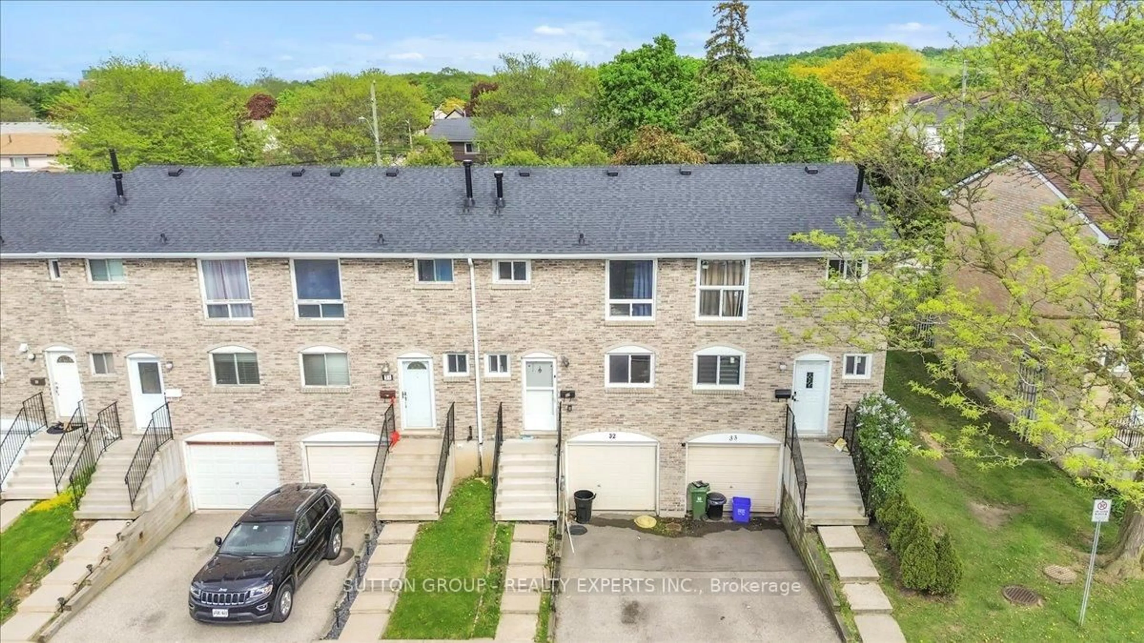 A pic from outside/outdoor area/front of a property/back of a property/a pic from drone, street for 120 Quigley Rd #32, Hamilton Ontario L8K 6L4