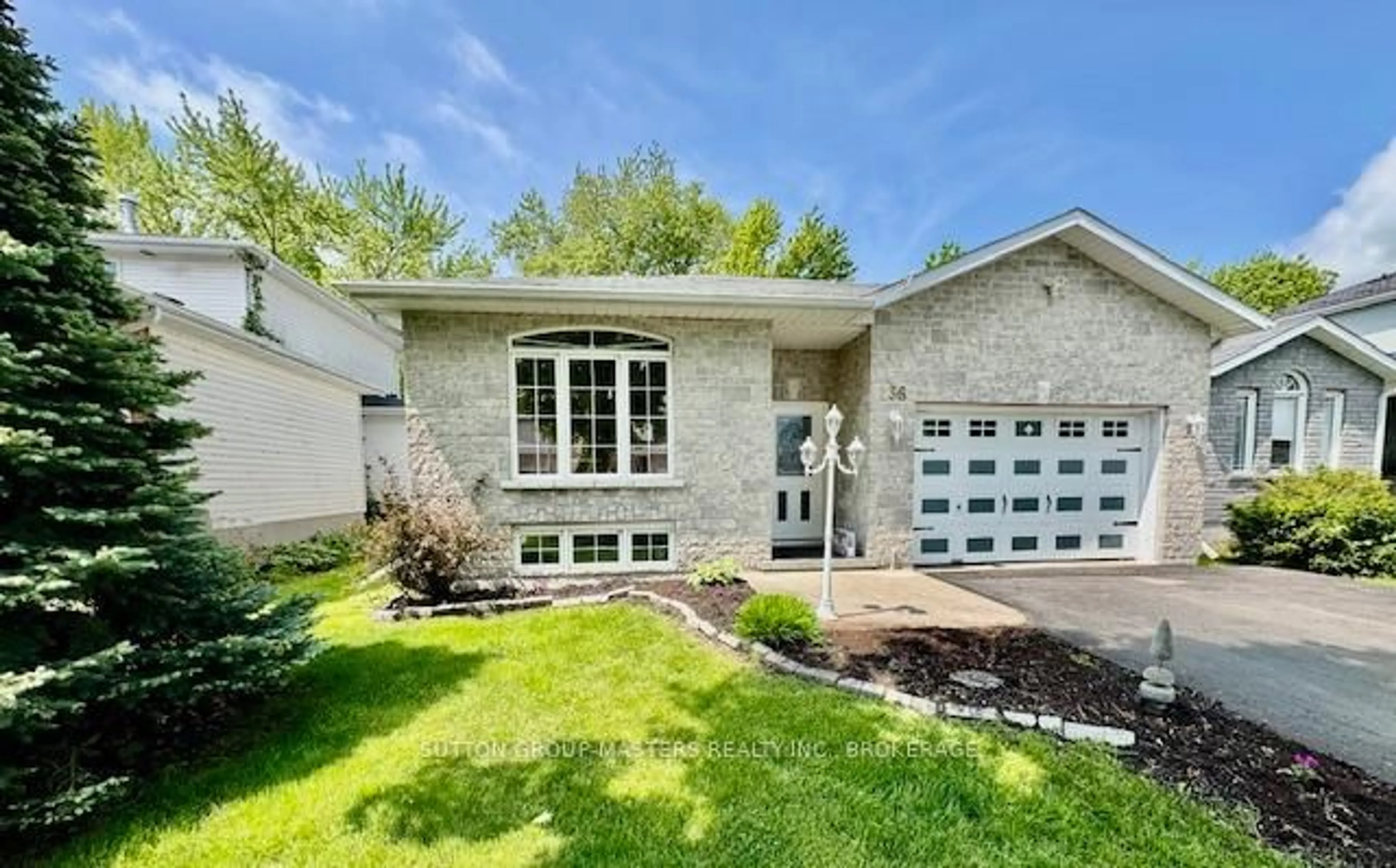 Home with brick exterior material, street for 136 Amy Lynn Dr, Loyalist Ontario K7N 2A2