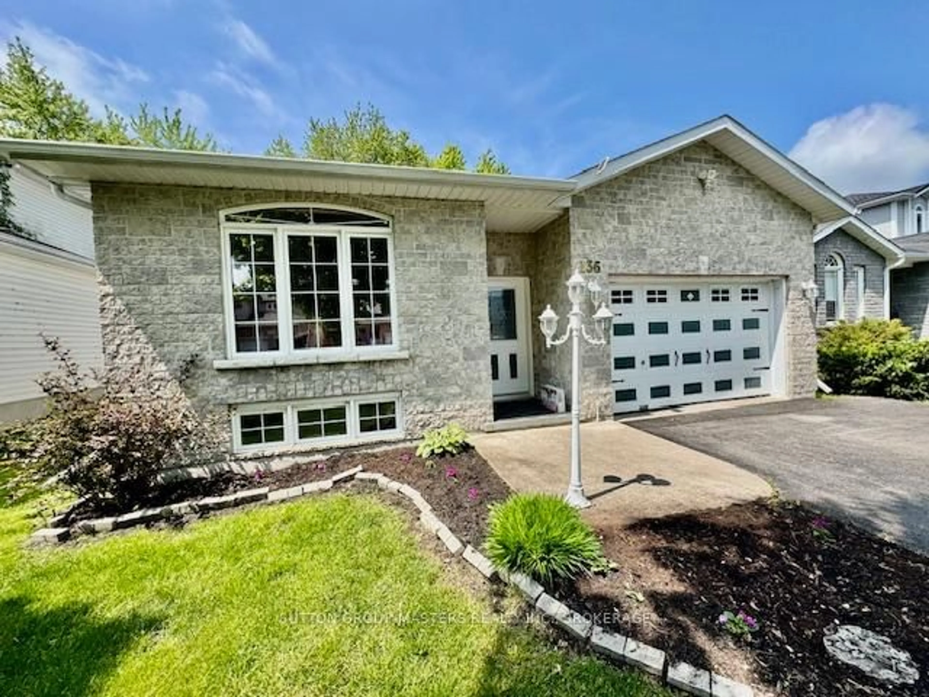 Home with brick exterior material, street for 136 Amy Lynn Dr, Loyalist Ontario K7N 2A2