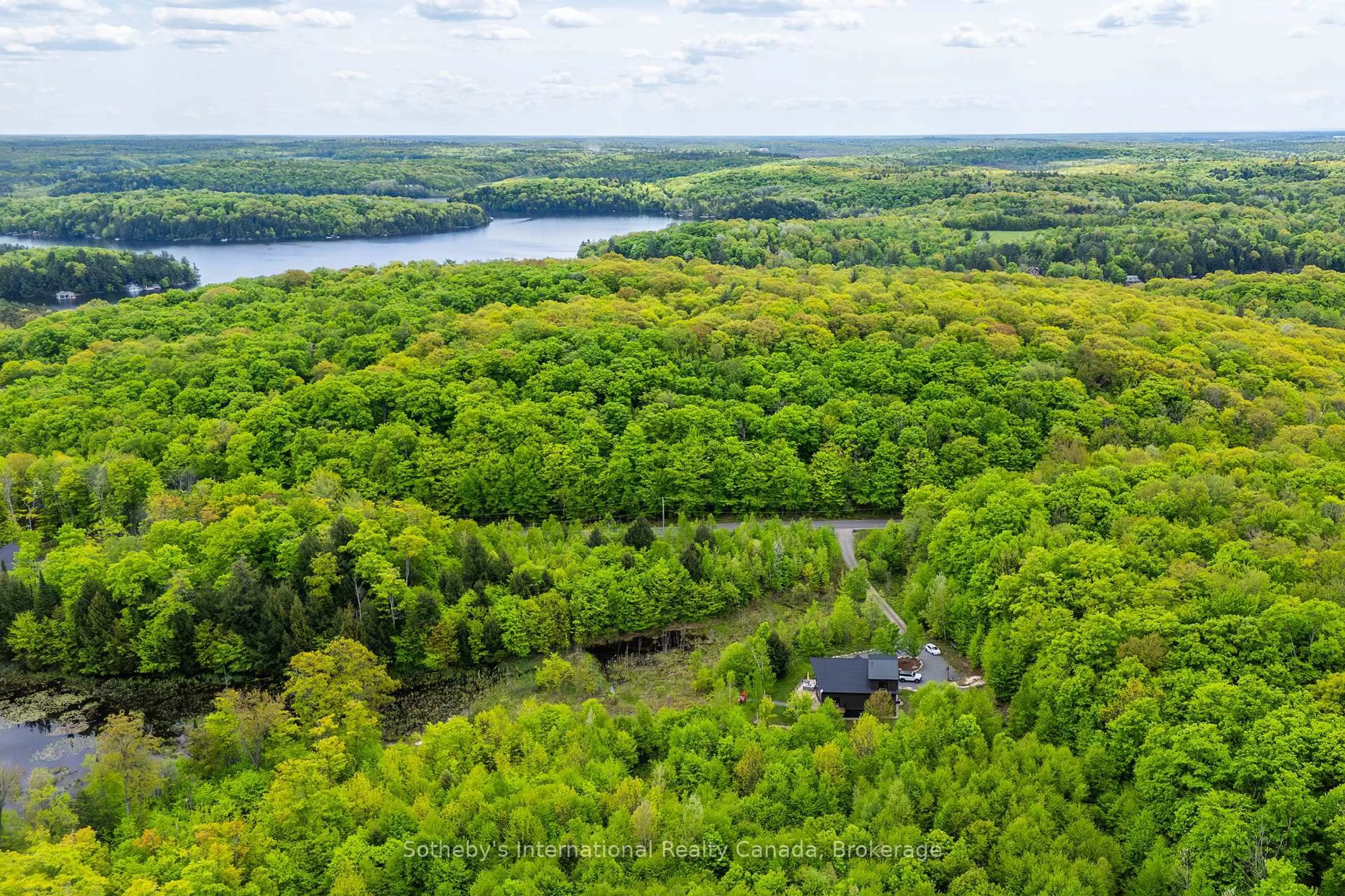 A pic from outside/outdoor area/front of a property/back of a property/a pic from drone, water/lake/river/ocean view for 1241 Northshore Rd, Muskoka Lakes Ontario P0B 1M0