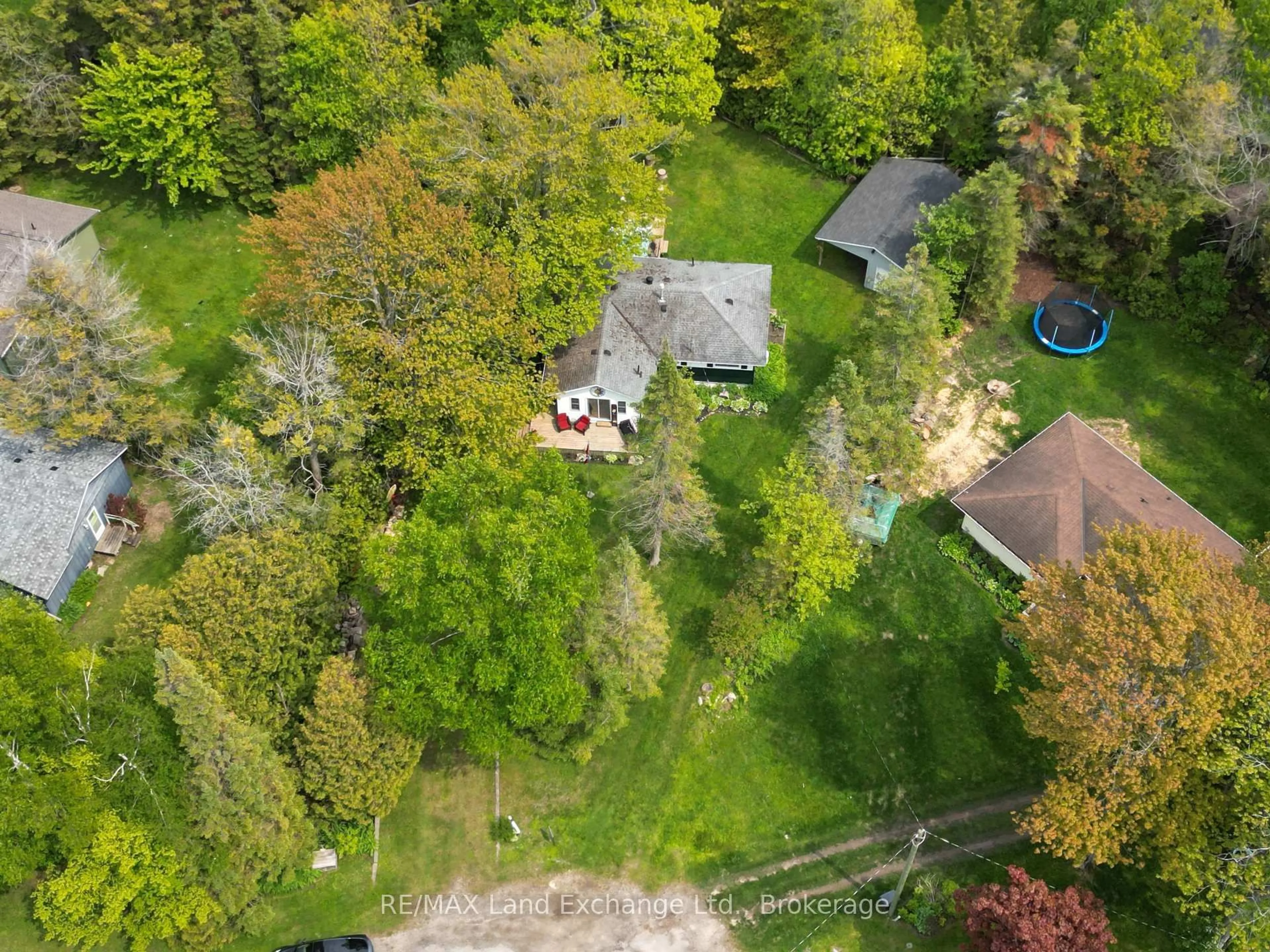 A pic from outside/outdoor area/front of a property/back of a property/a pic from drone, forest/trees view for 702 Yosacha Pl, Huron-Kinloss Ontario N2Z 2X3