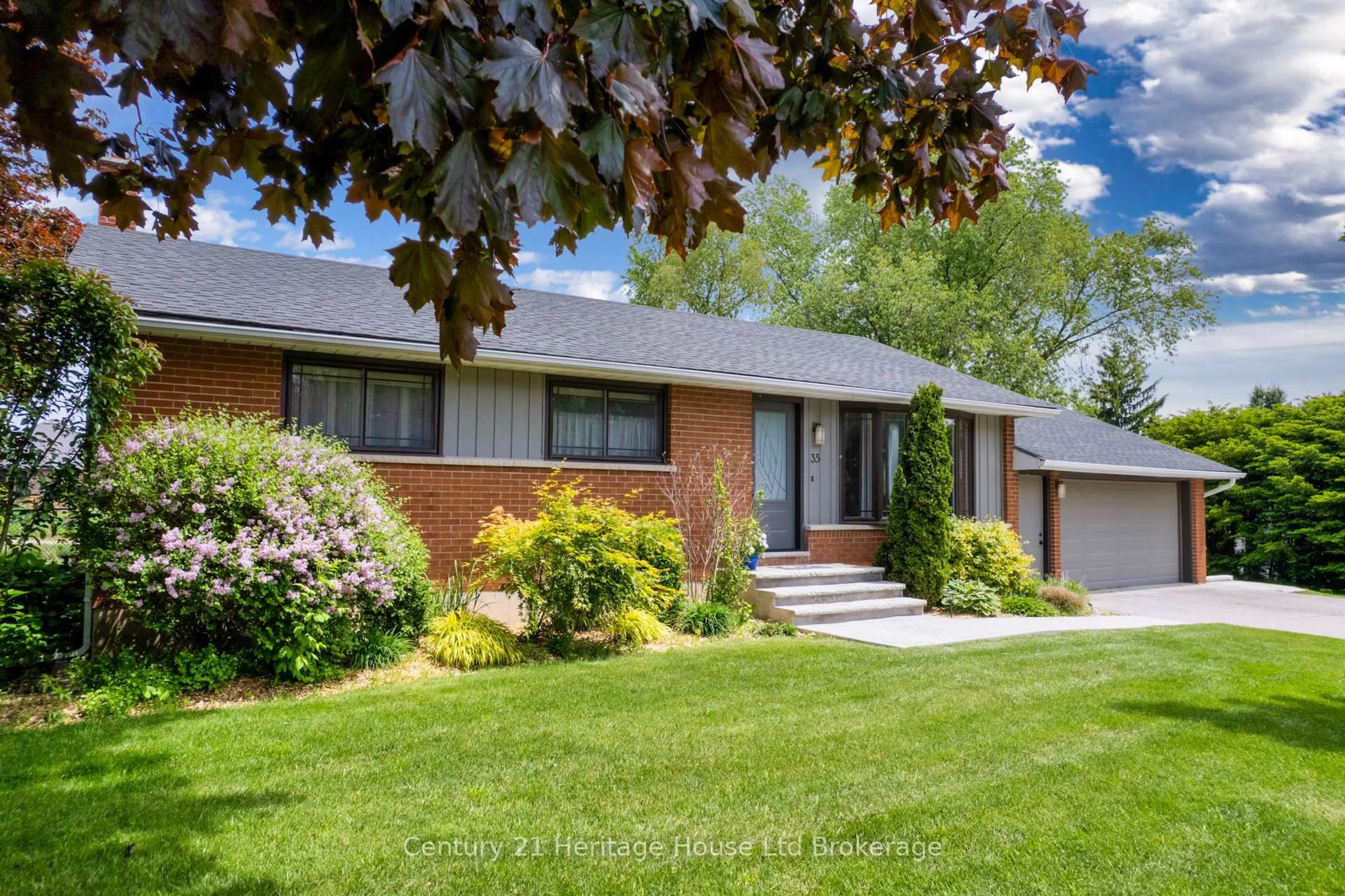 Home with brick exterior material, street for 35 Tanager Dr, Tillsonburg Ontario N4G 1B1