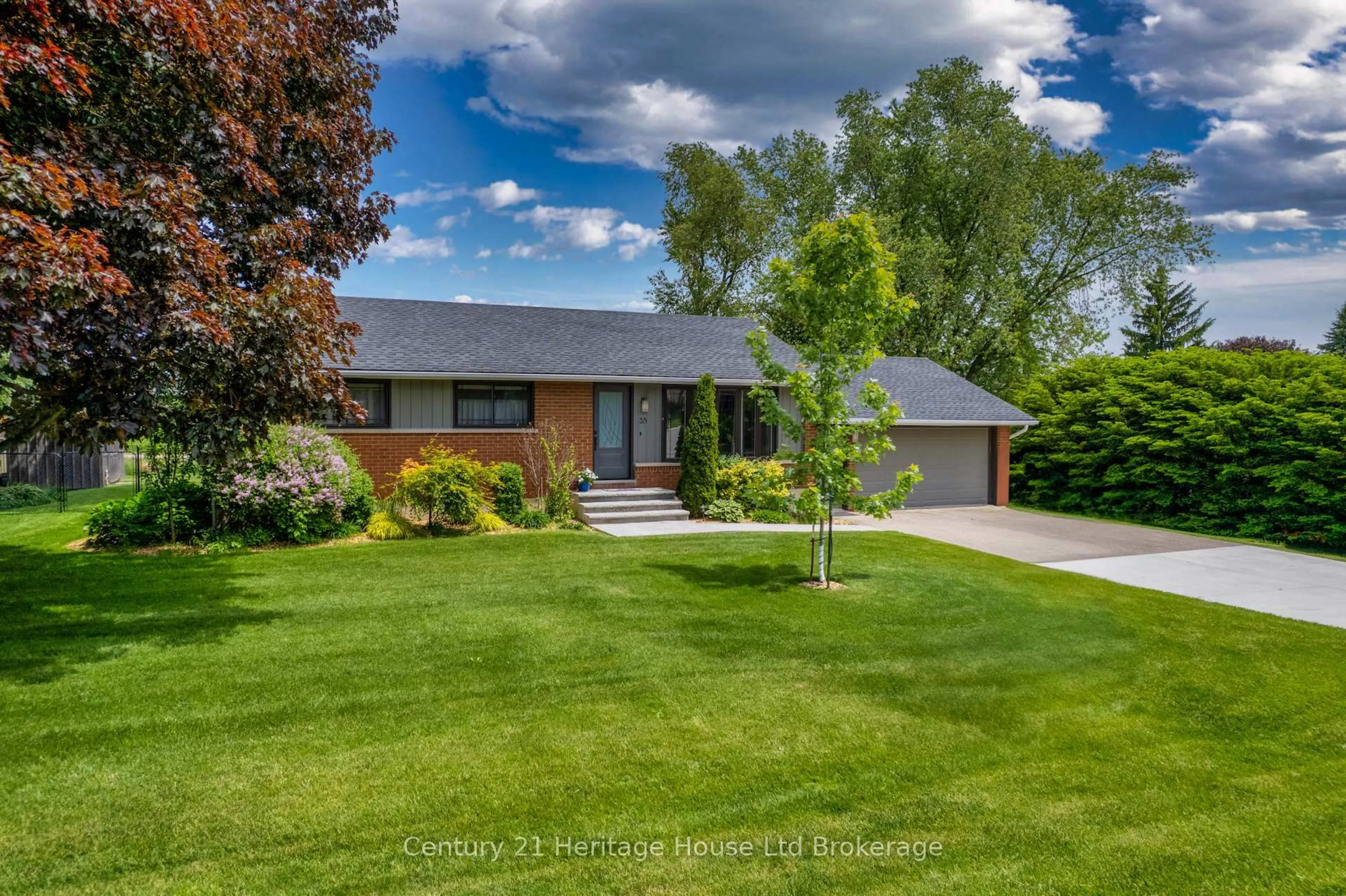 Home with brick exterior material, street for 35 Tanager Dr, Tillsonburg Ontario N4G 1B1