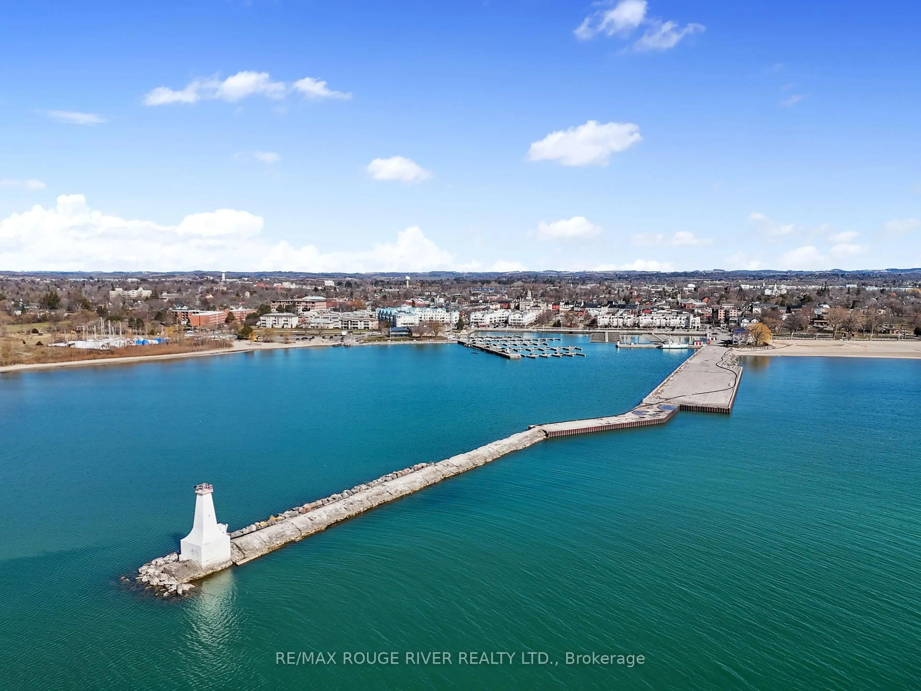 A pic from outside/outdoor area/front of a property/back of a property/a pic from drone, water/lake/river/ocean view for 107 Marisa Lane #406, Cobourg Ontario K9A 5N6